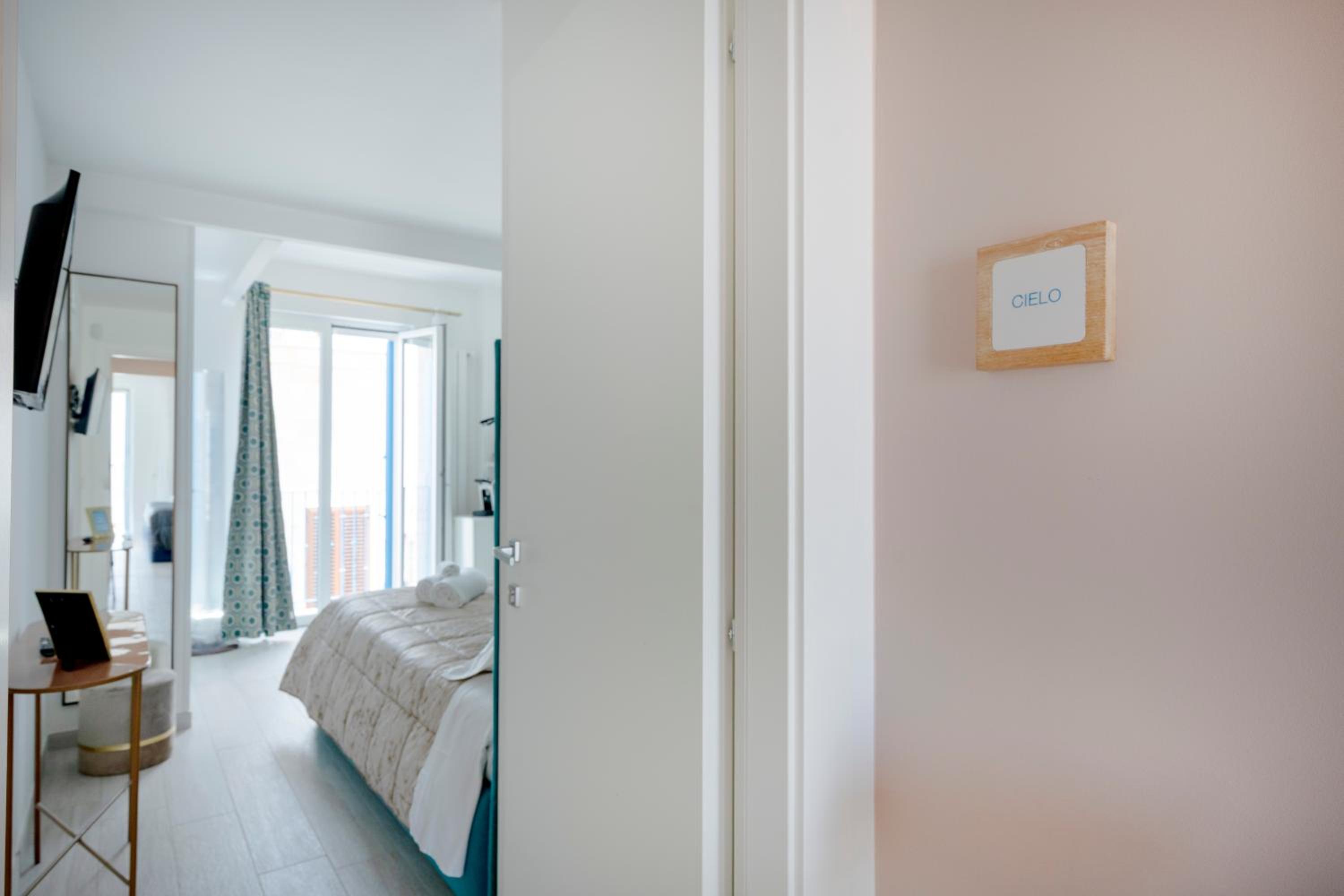 Cielo | Suite con Bagno e Cucina Condivisa – Centrale