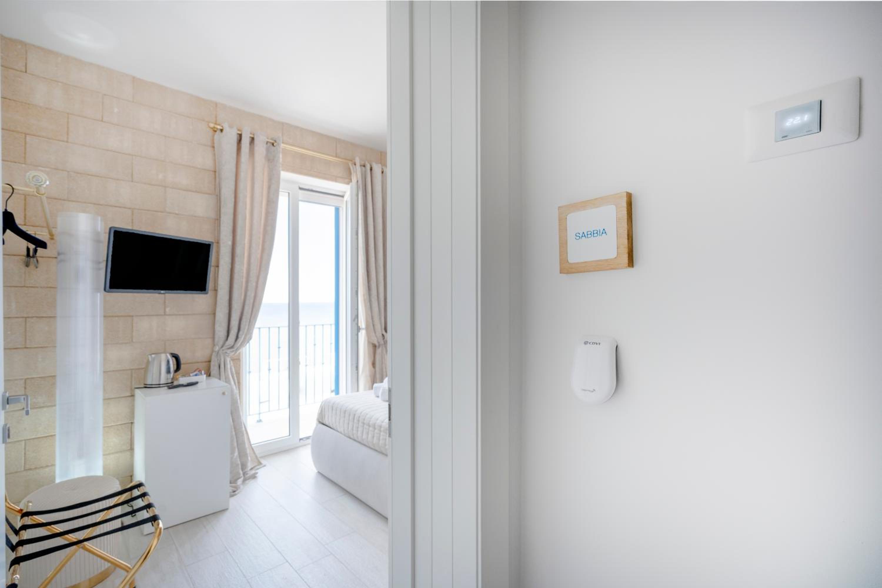 Terra | 2-Bedroom with Shared Kitchen & Balcony – Seafront Location
