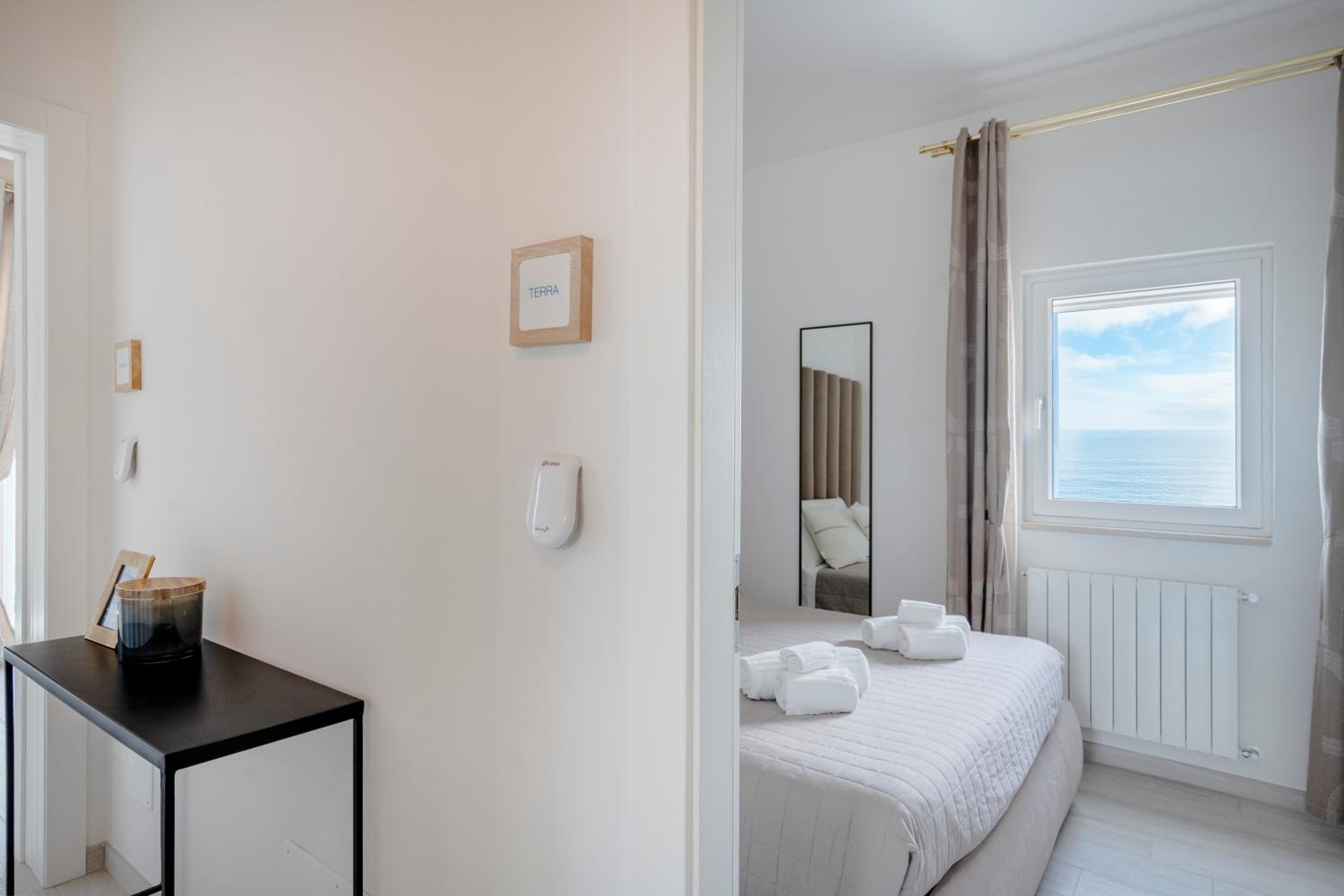 Terra | 2-Bedroom with Shared Kitchen & Balcony – Seafront Location