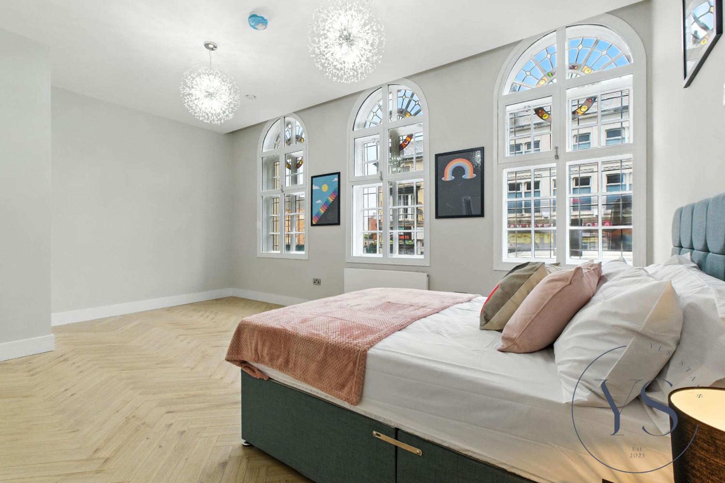 5BR Birmingham Apt with Parking, Arcade Games & Wi-Fi