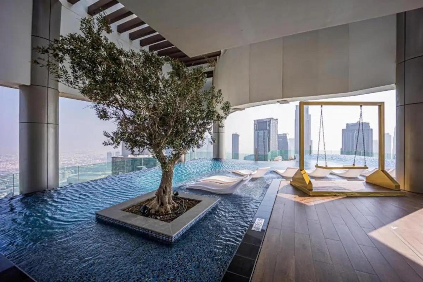 Luxury 49th Floor 2BR Corner Apt with Burj Khalifa View and Infinity Pool Access