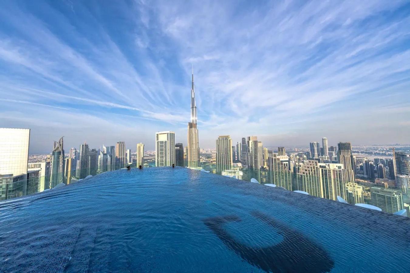 Luxury 49th Floor 2BR Corner Apt with Burj Khalifa View and Infinity Pool Access