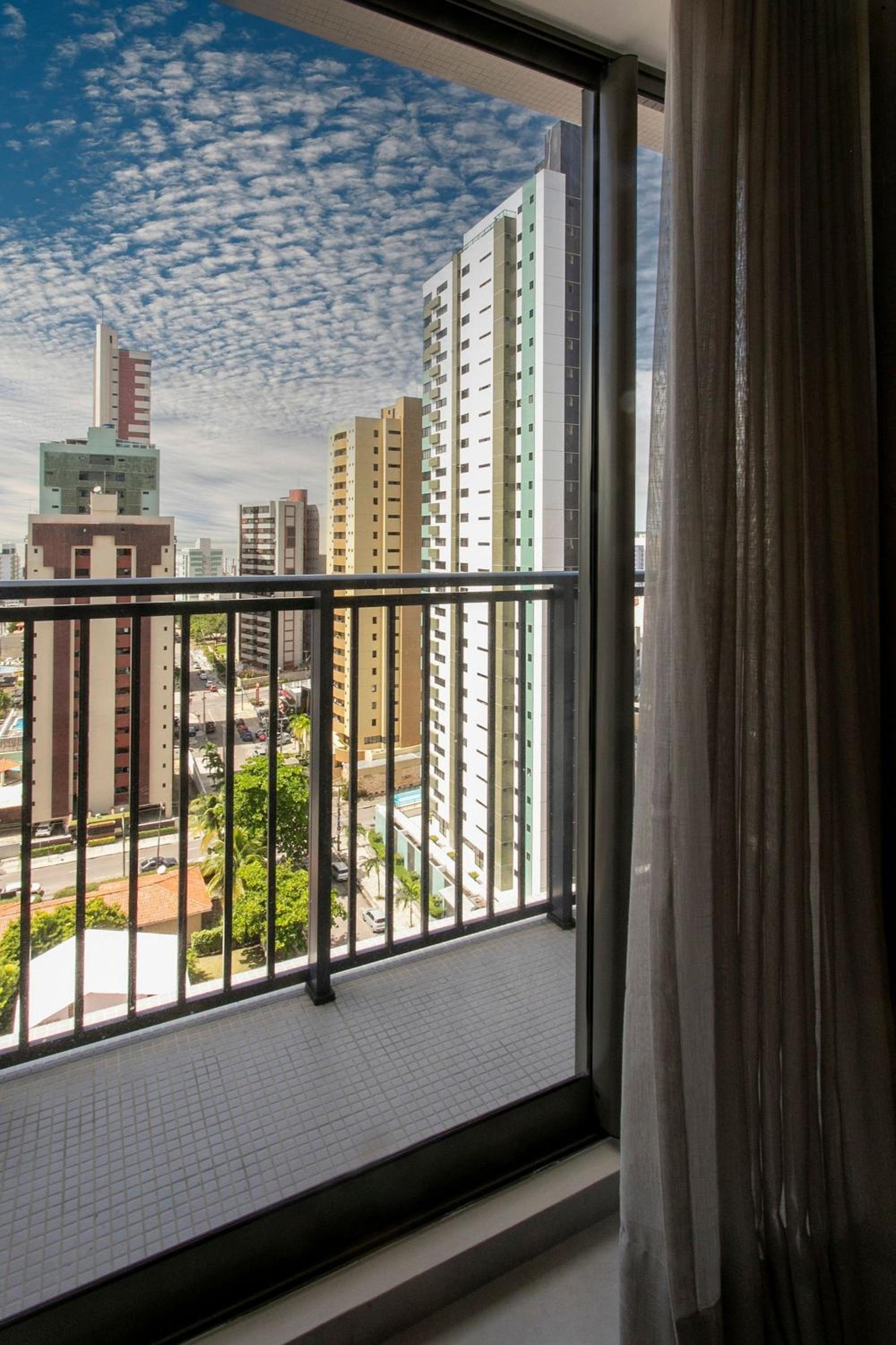 Simple Smart By Xtay - Bleisure in João Pessoa: pool, gym, and laundry near Tropical Center and HNSN