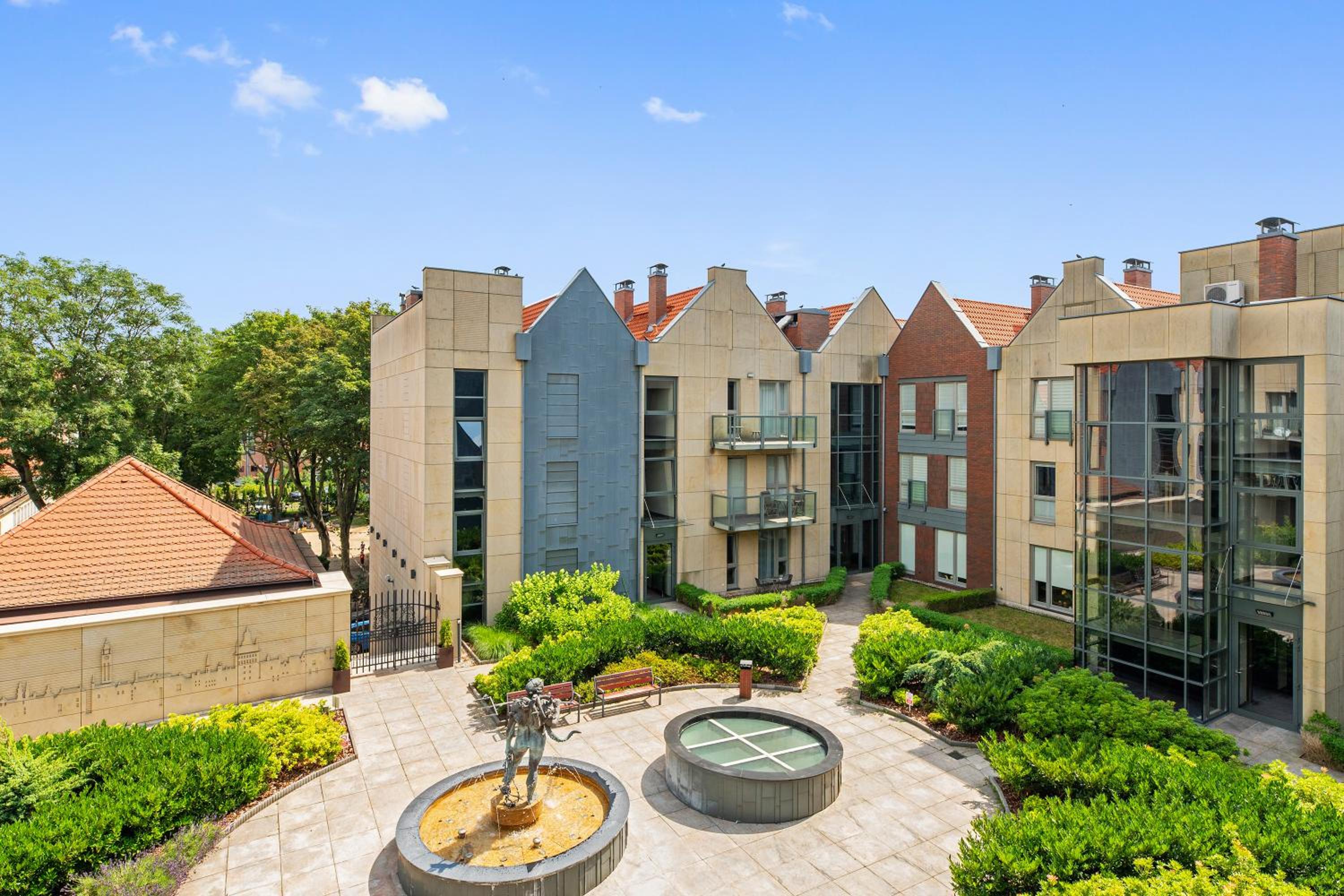 Kwartał Kamienic by Downtown Apartments