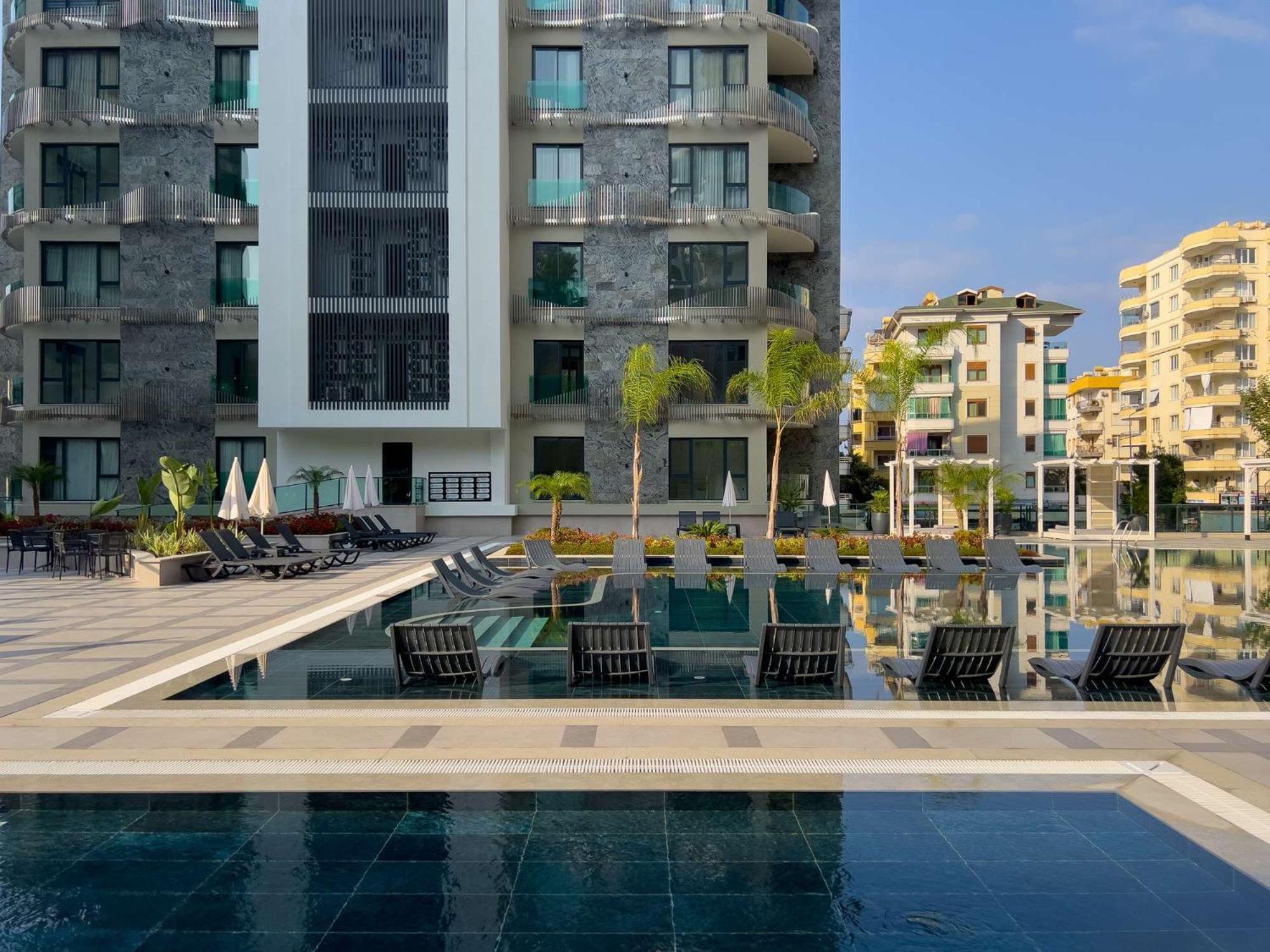 Qoople Excellence B55 designer duplex by the sea
