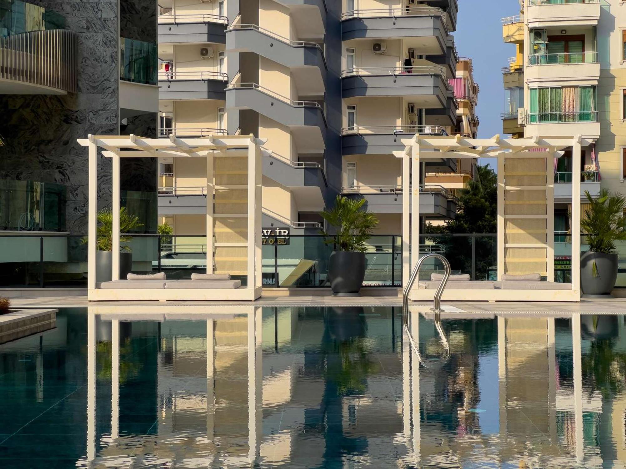 Qoople Excellence B55 designer duplex by the sea