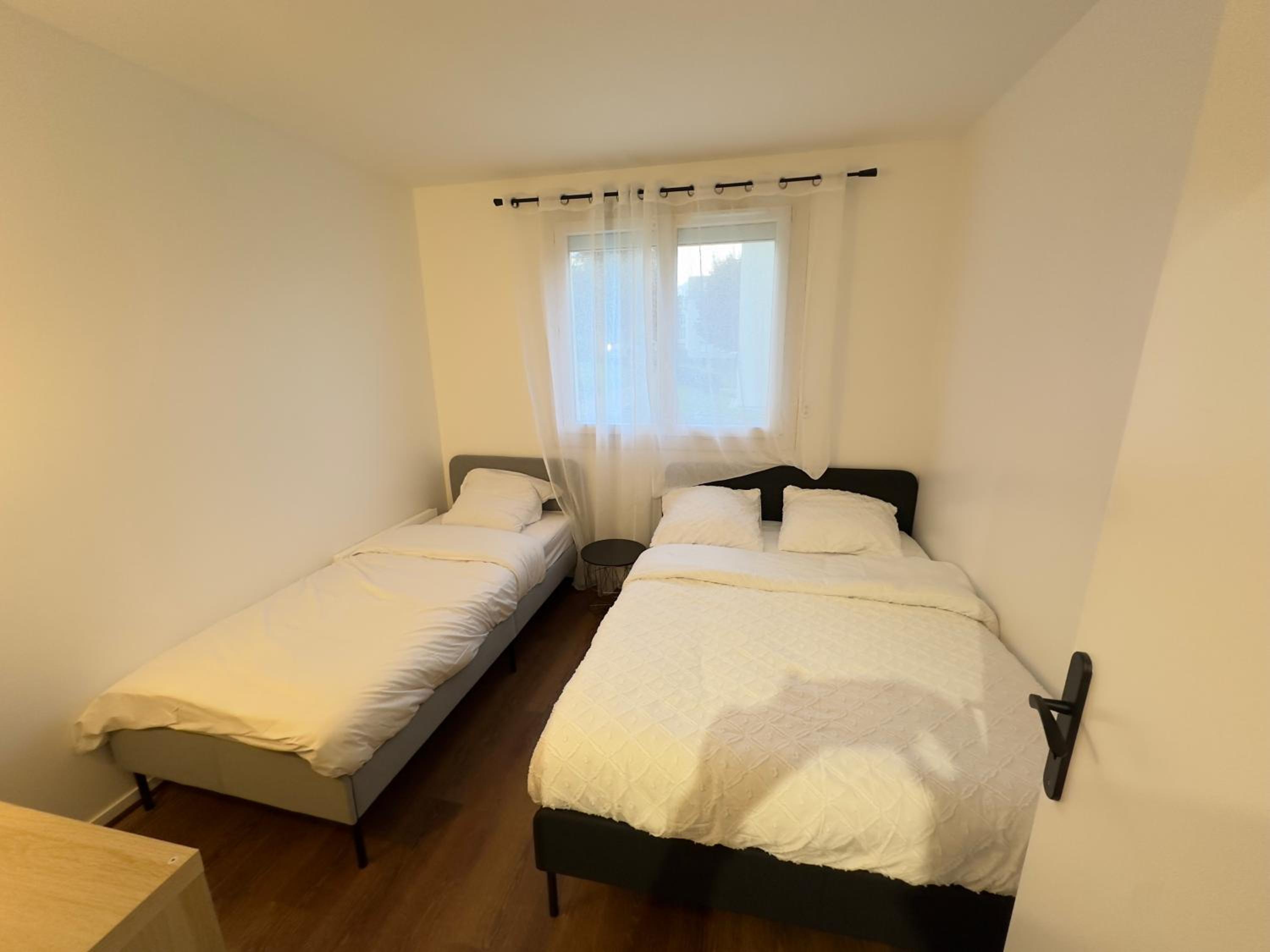 Confort et Verdure 2 Pièces Moderne avec Parking à Domont by Immo Kit Bnb