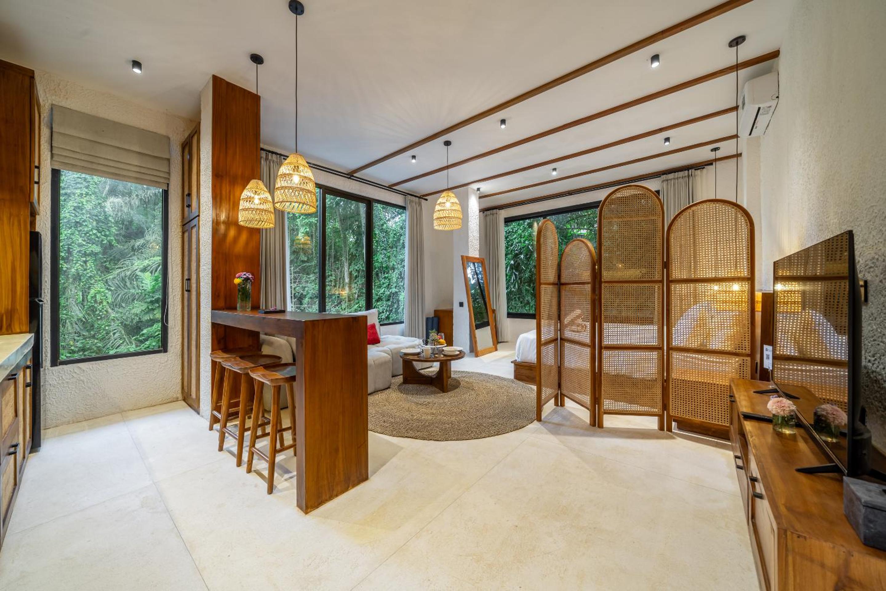 Sacred Jungle by EVDEkimi - Stylish Jungle Retreat with Apartments & Villas with Kitchens, Pools and Concierge Service in Ubud