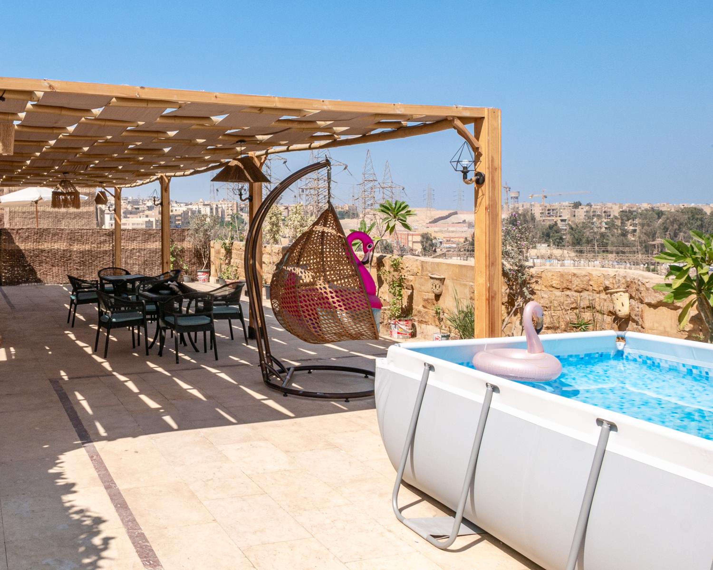 Pyramidia Serene with Rooftop, Pool & pyramids view