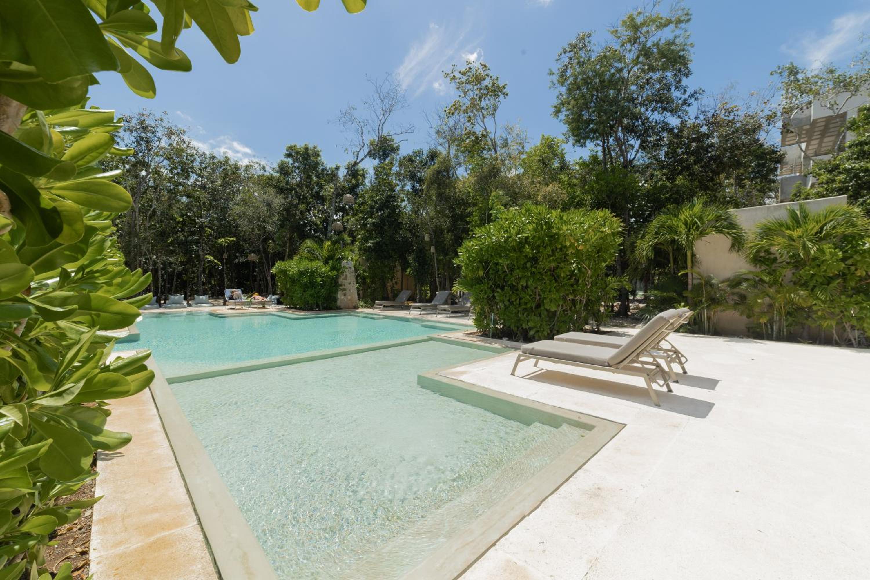 BT Homes - Tulum - Exclusiva villa de lujo con piscina, gym y pista de pádel