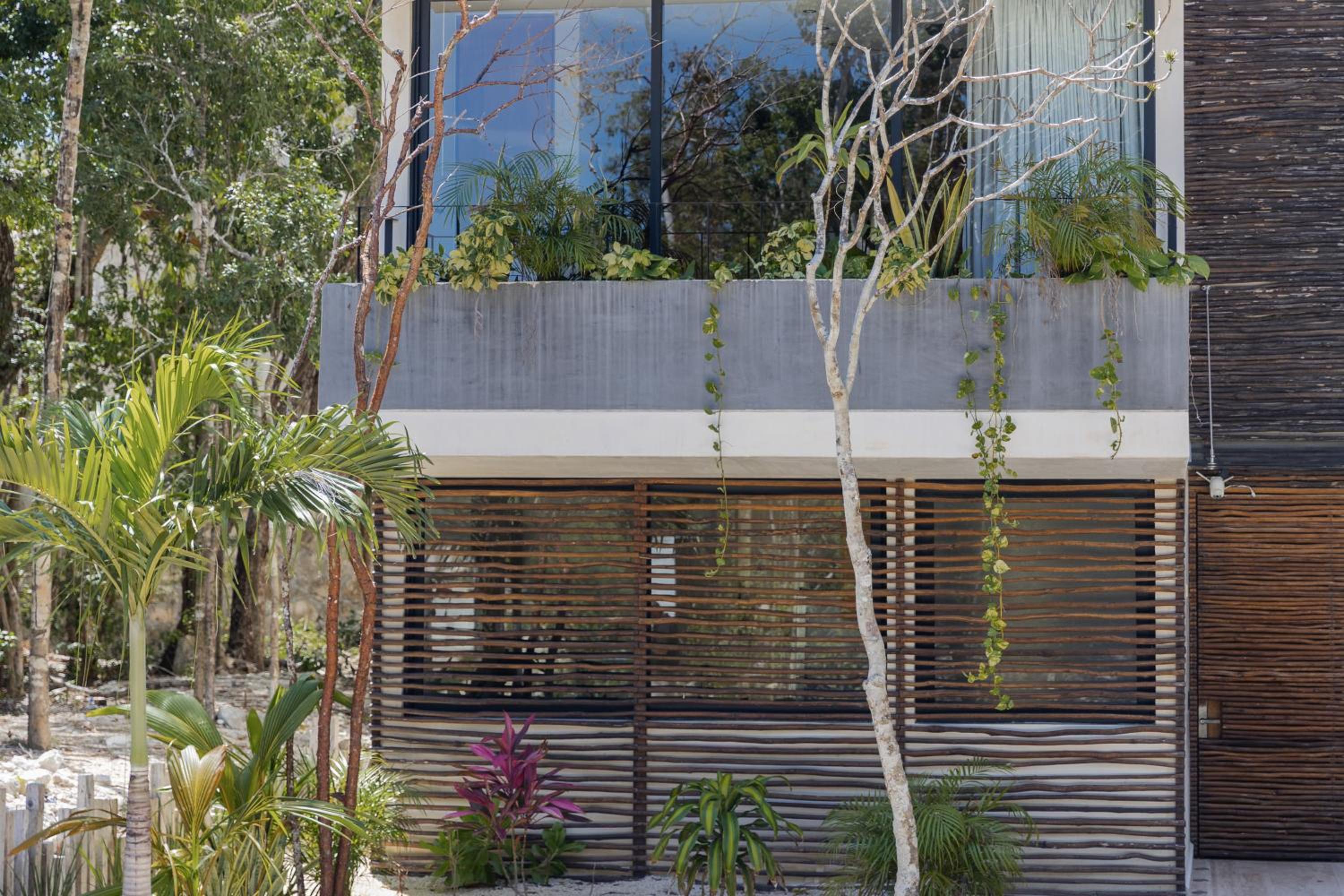 BT Homes - Tulum - Exclusiva villa de lujo con piscina, gym y pista de pádel