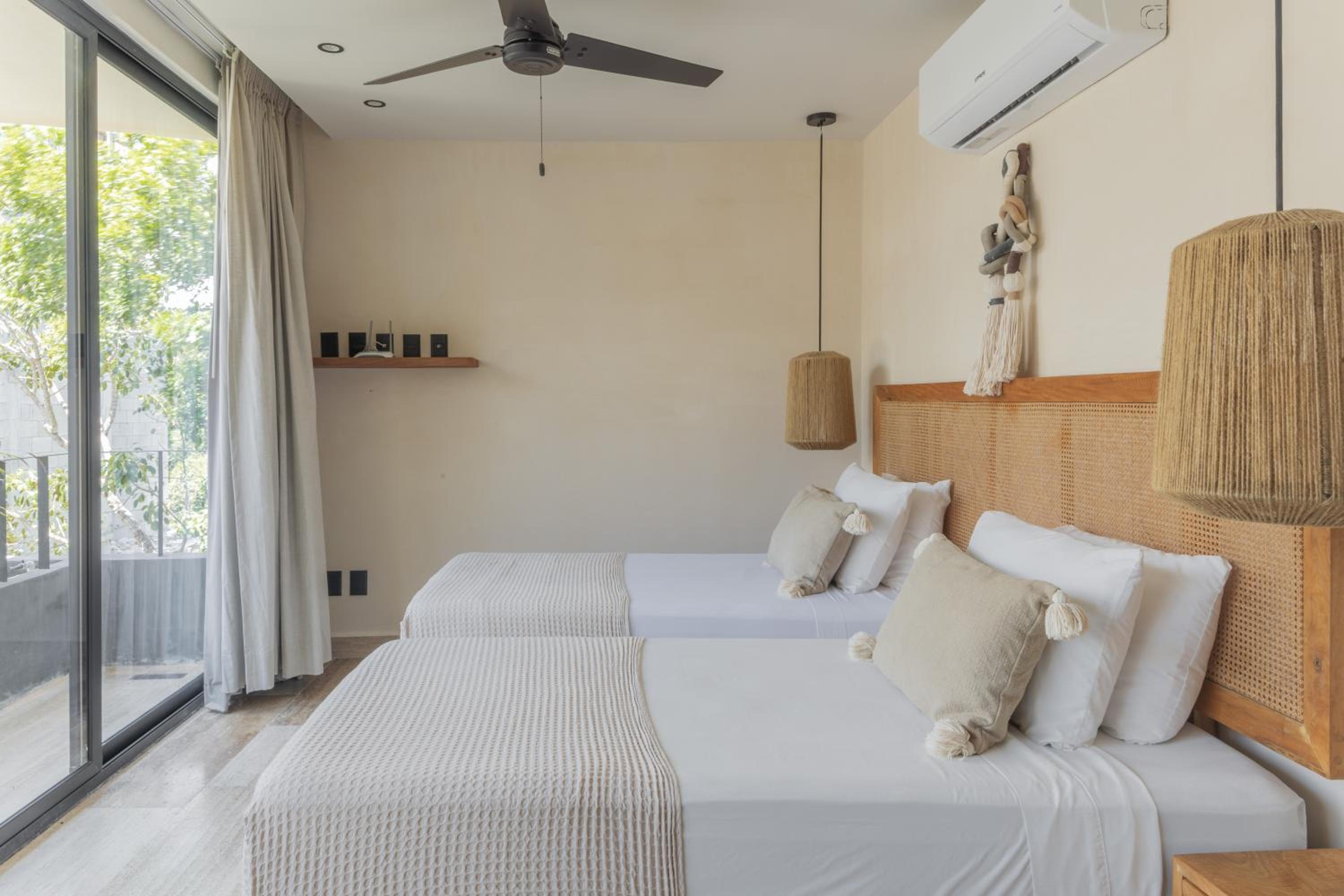 BT Homes - Tulum - Exclusiva villa de lujo con piscina, gym y pista de pádel