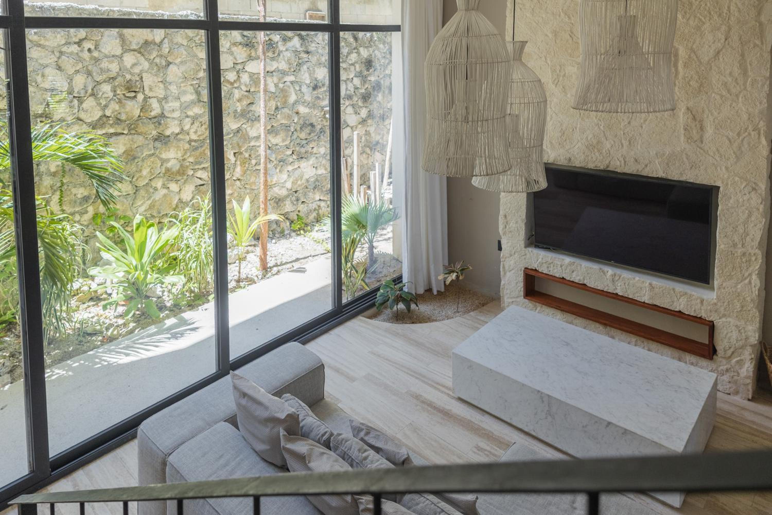 BT Homes - Tulum - Exclusiva villa de lujo con piscina, gym y pista de pádel