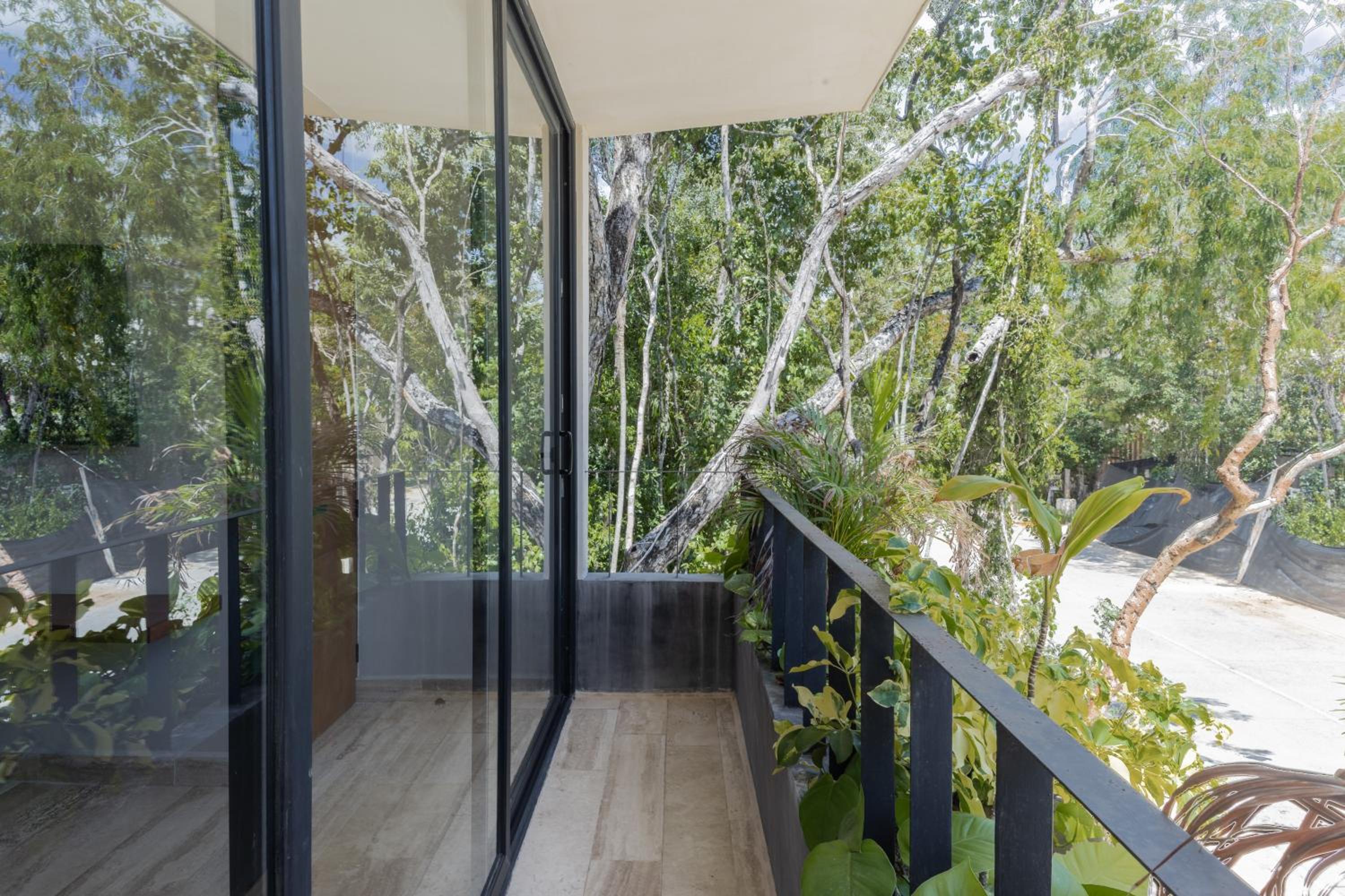 BT Homes - Tulum - Exclusiva villa de lujo con piscina, gym y pista de pádel