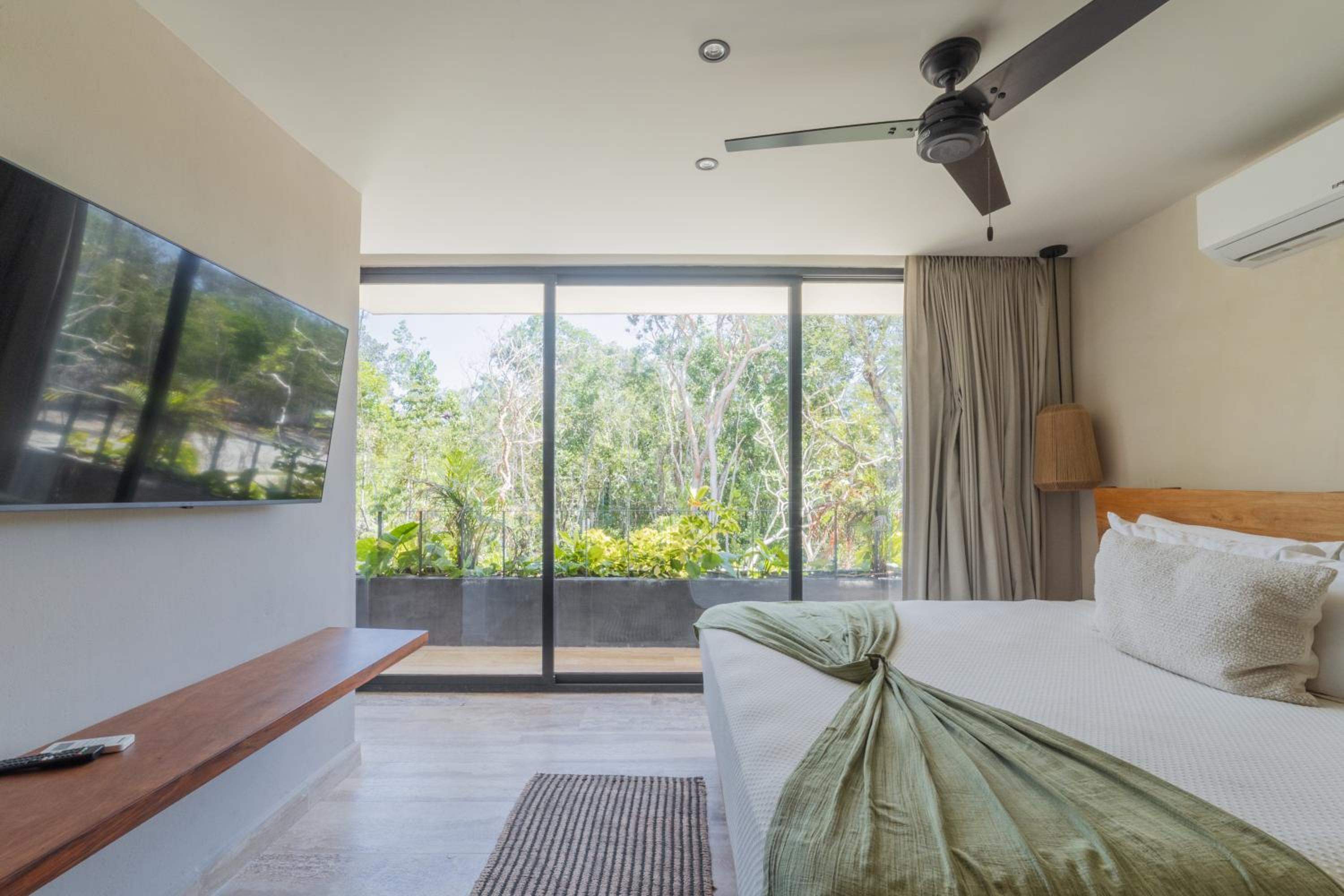 BT Homes - Tulum - Exclusiva villa de lujo con piscina, gym y pista de pádel