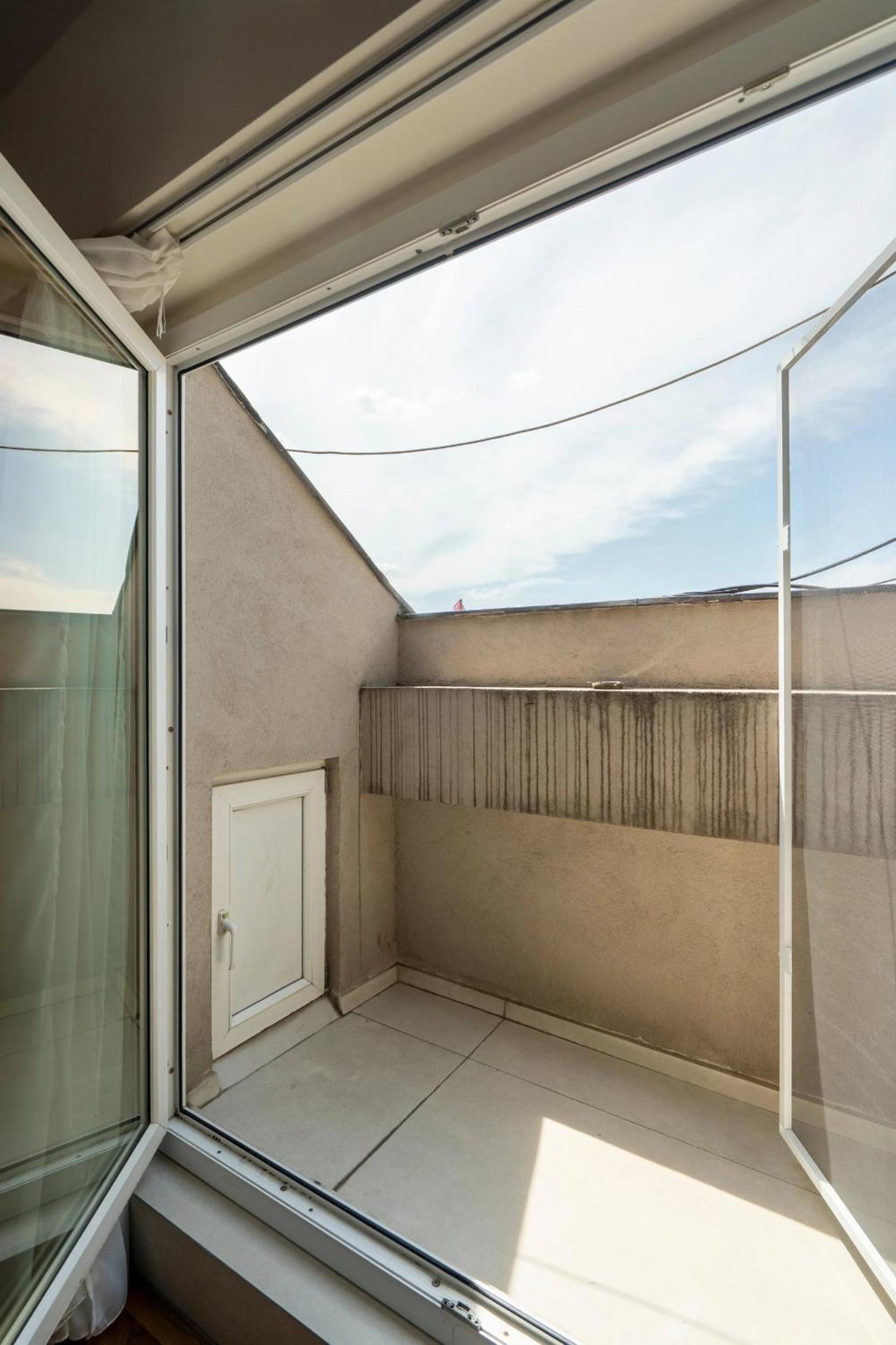 Quirky Top-Floor 1BR Nest in the Historic Center