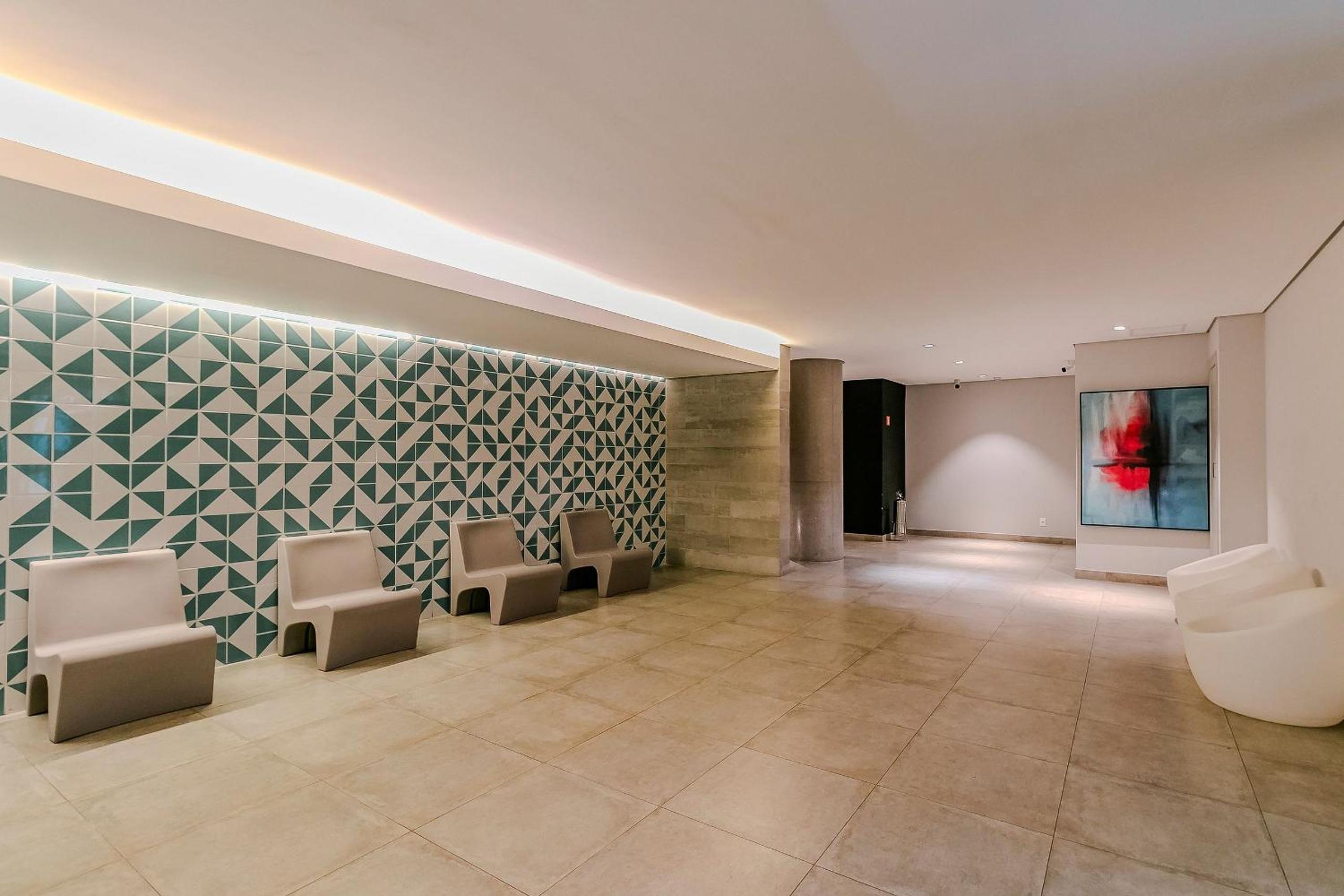 Studio com coworking, piscina e vista da cidade