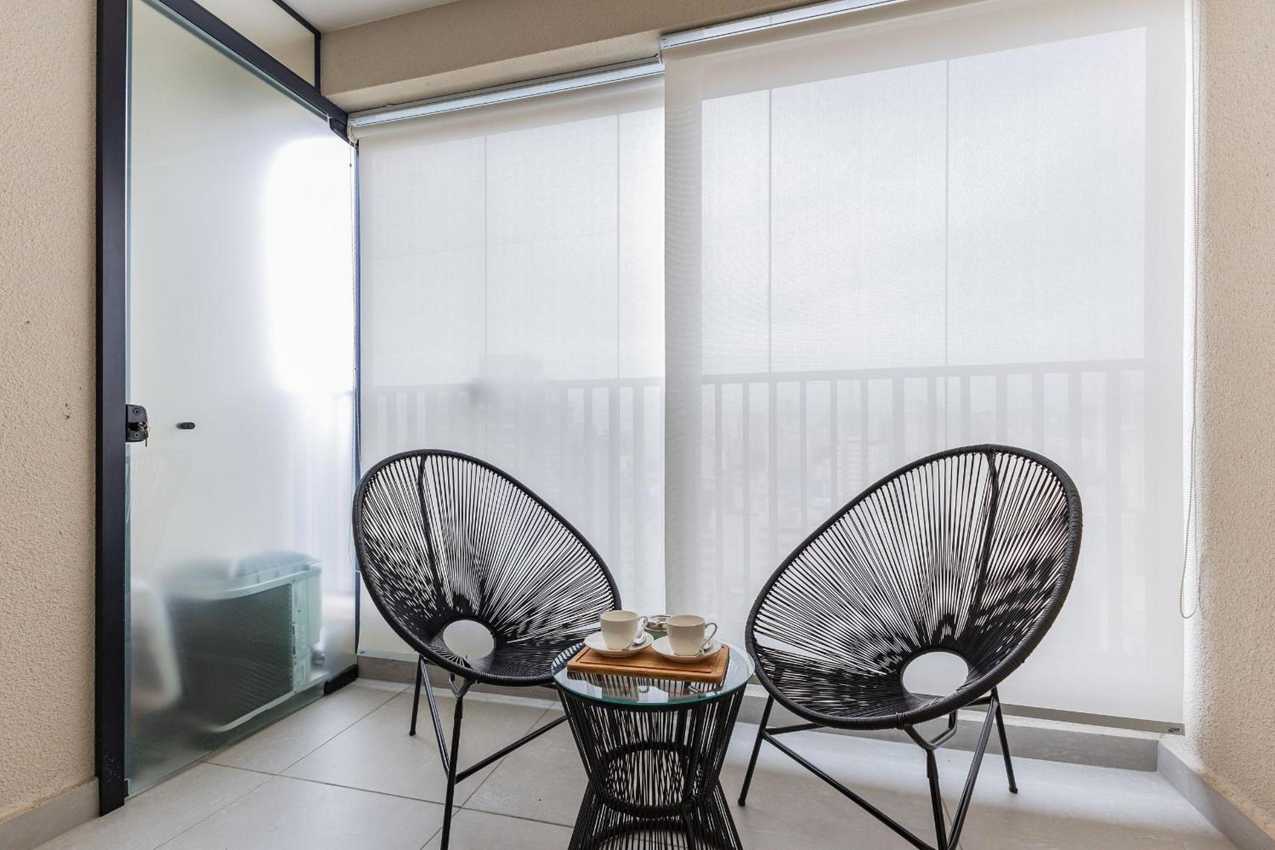 Studio com coworking, piscina e vista da cidade
