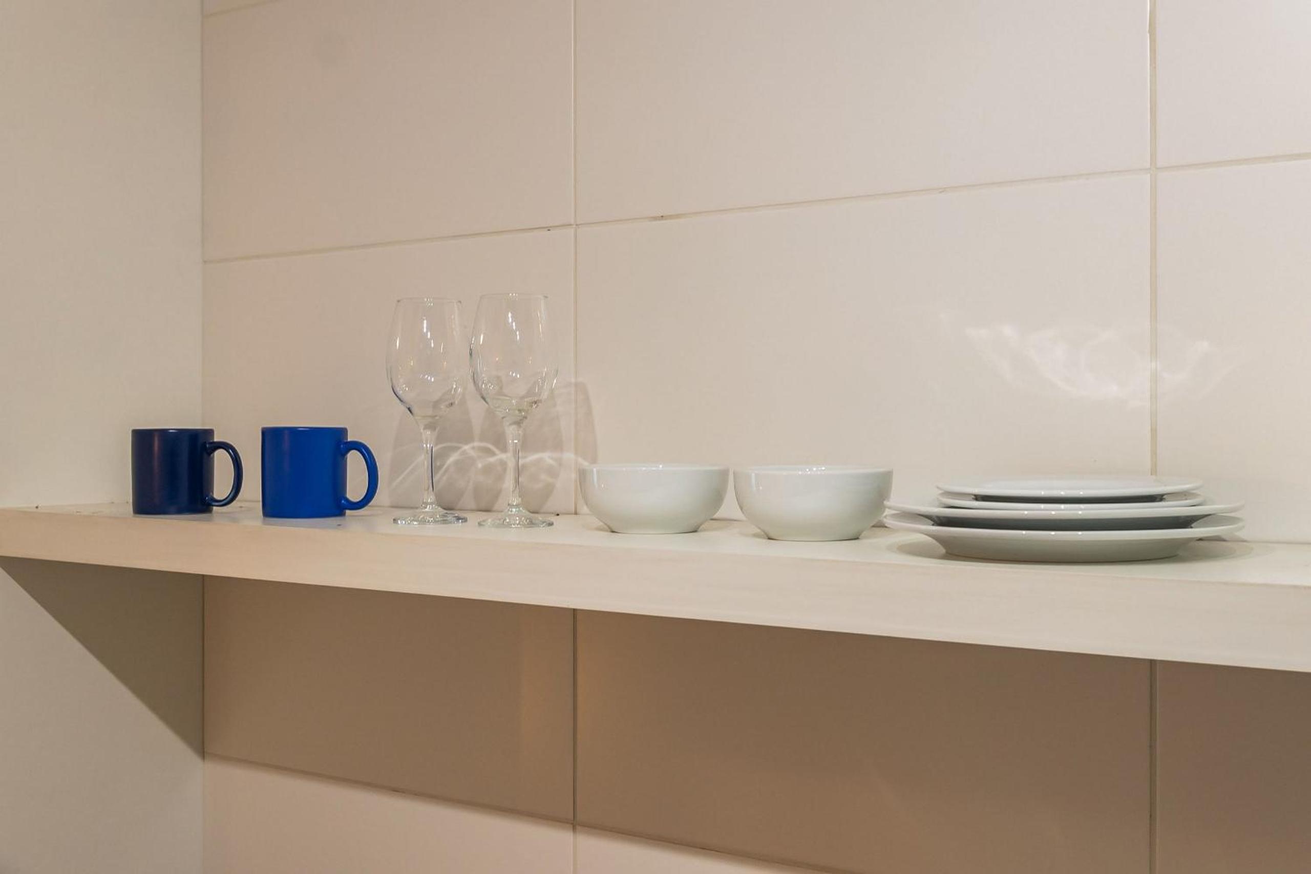 Studio com coworking, piscina e vista da cidade
