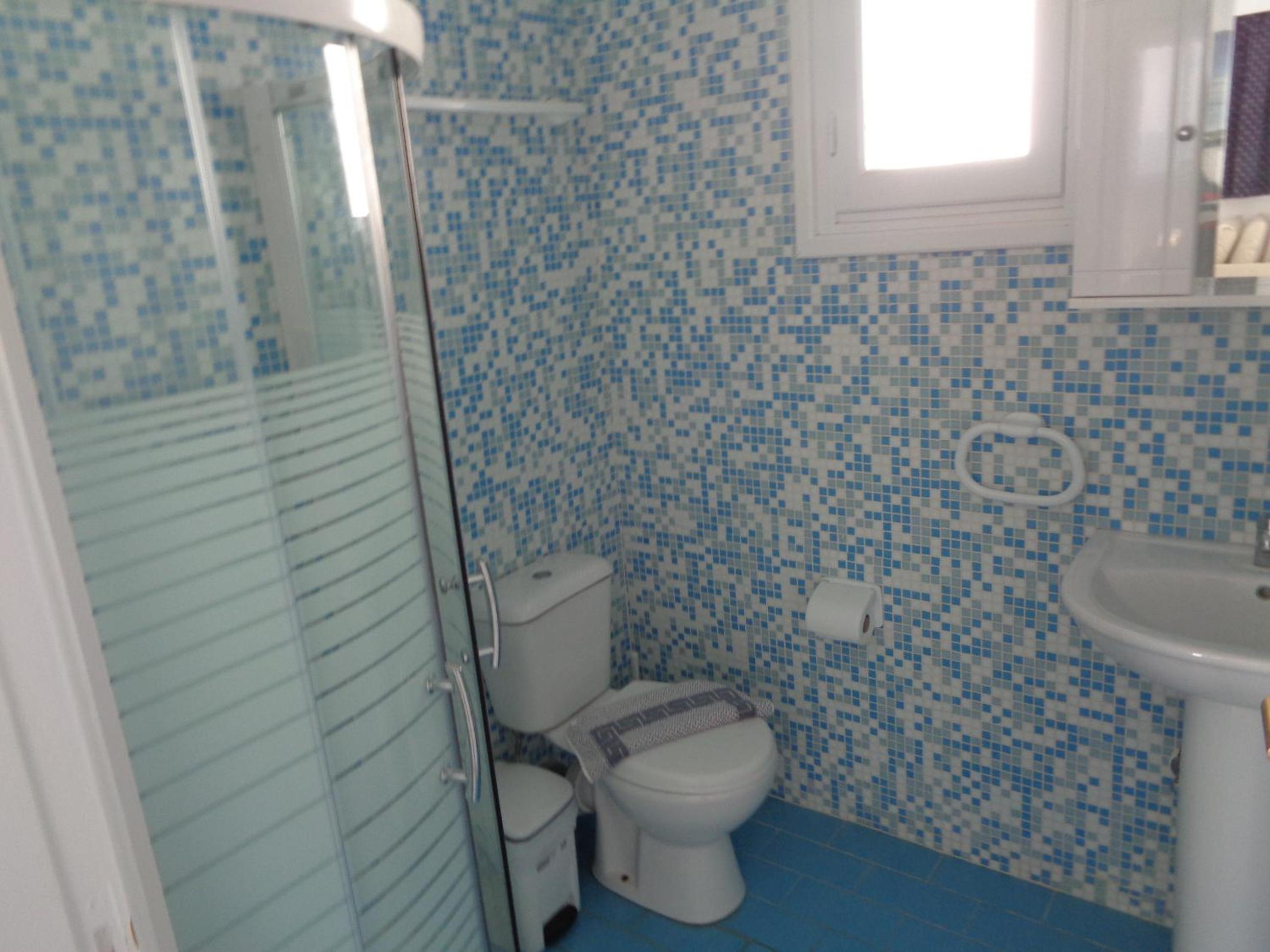 Blue and White Studios & Apartments