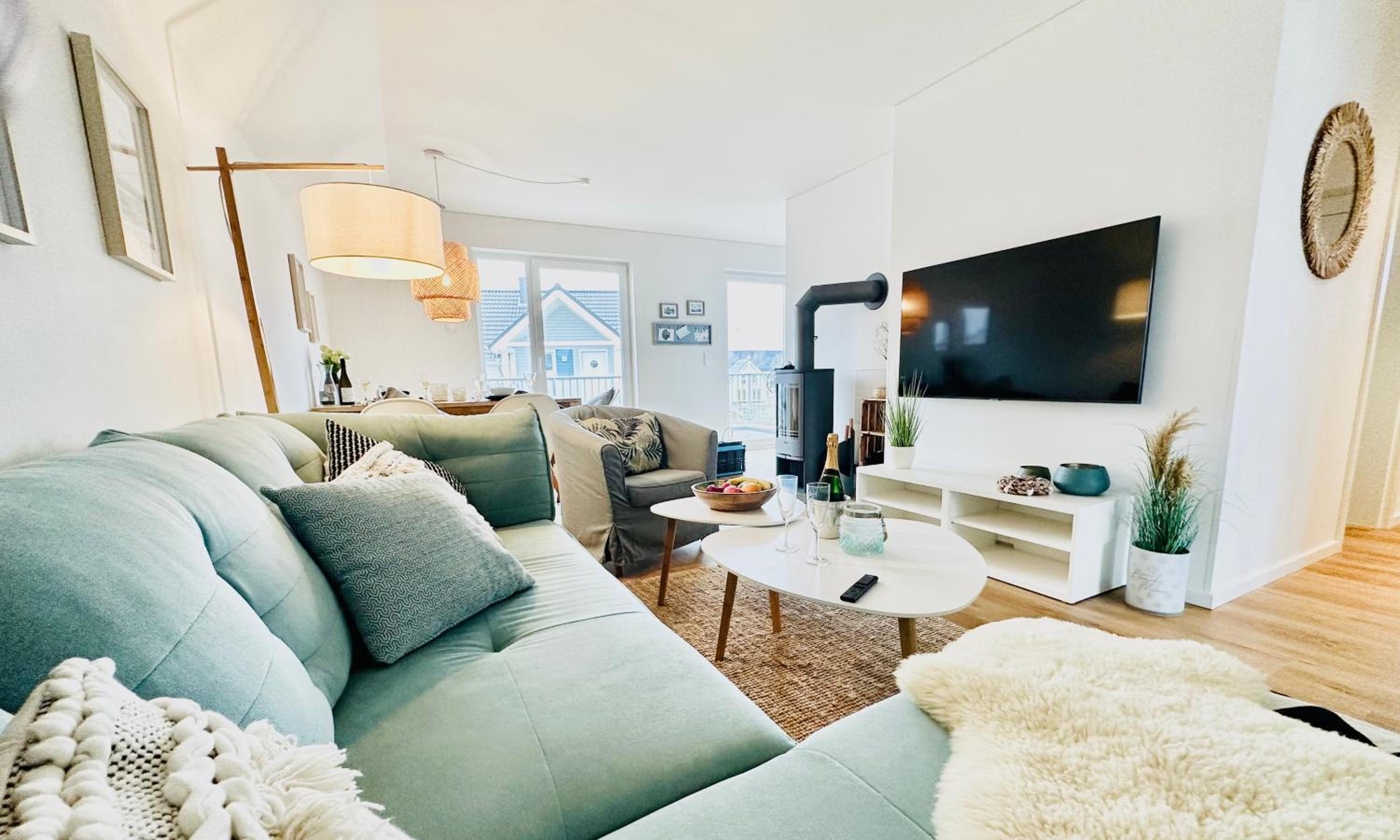 Surfbude, Olpenitz - moderne Ferienwohnung in direkter Strandnähe mit eigenem Eingang, Sauna, Kaminofen, Balkonterrasse und Parkplatz