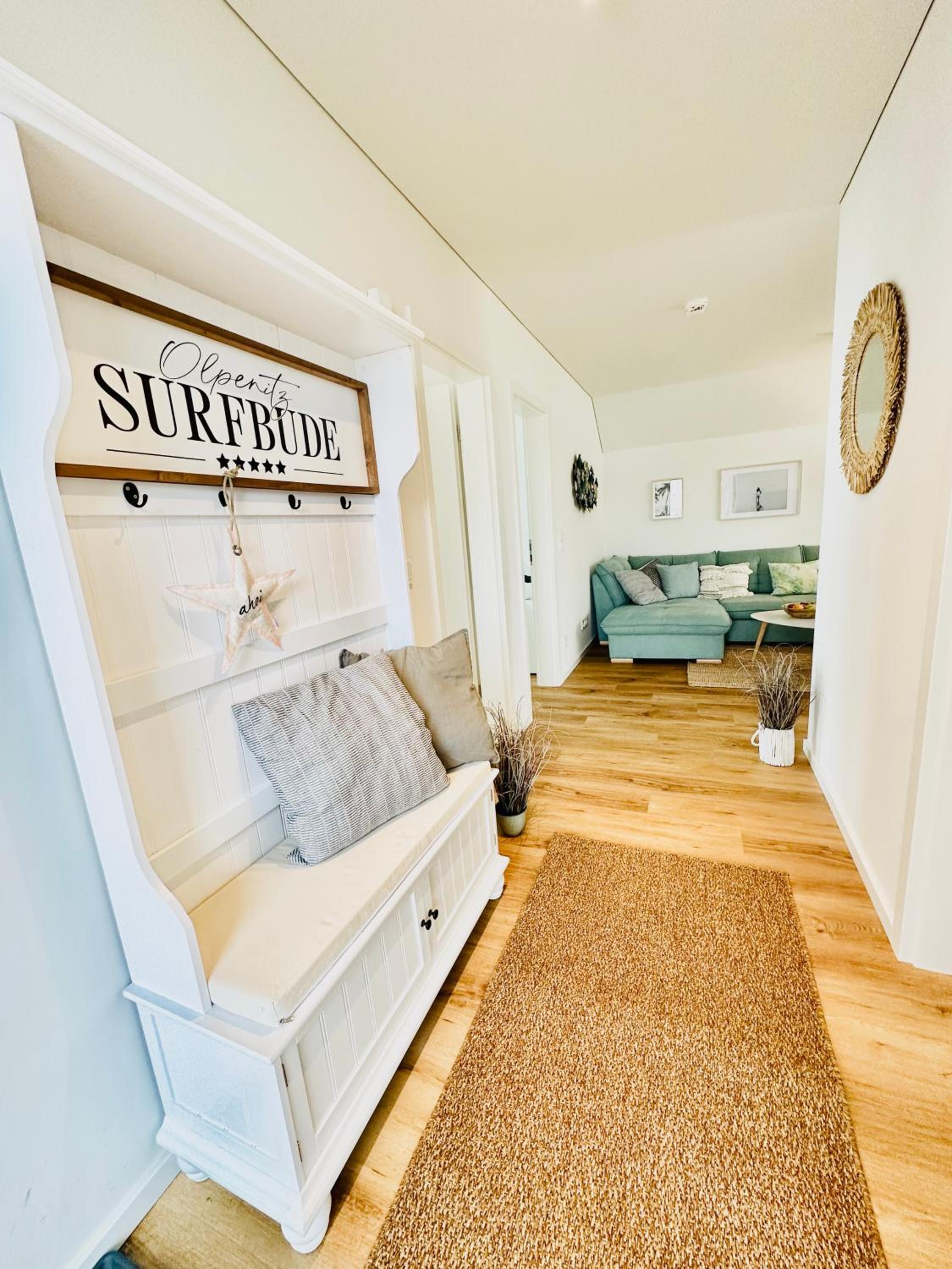 Surfbude, Olpenitz - moderne Ferienwohnung in direkter Strandnähe mit eigenem Eingang, Sauna, Kaminofen, Balkonterrasse und Parkplatz