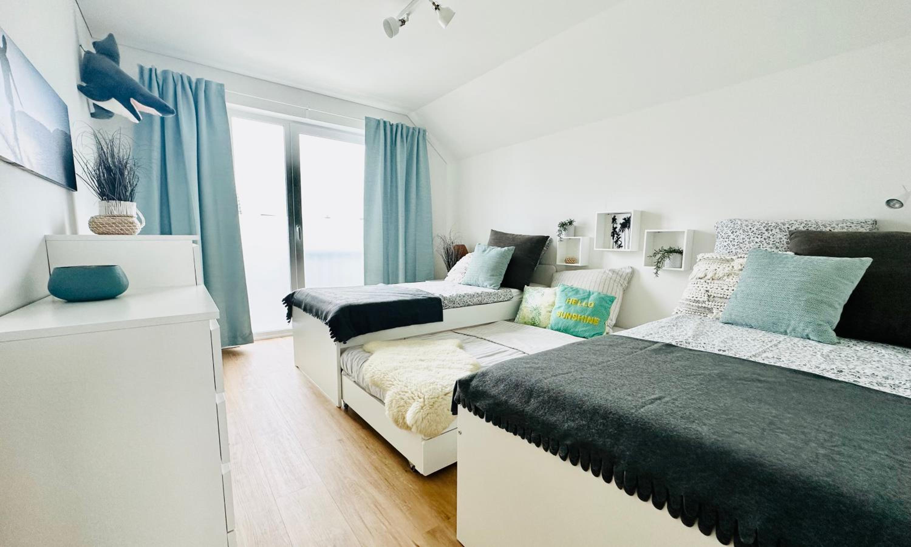 Surfbude, Olpenitz - moderne Ferienwohnung in direkter Strandnähe mit eigenem Eingang, Sauna, Kaminofen, Balkonterrasse und Parkplatz