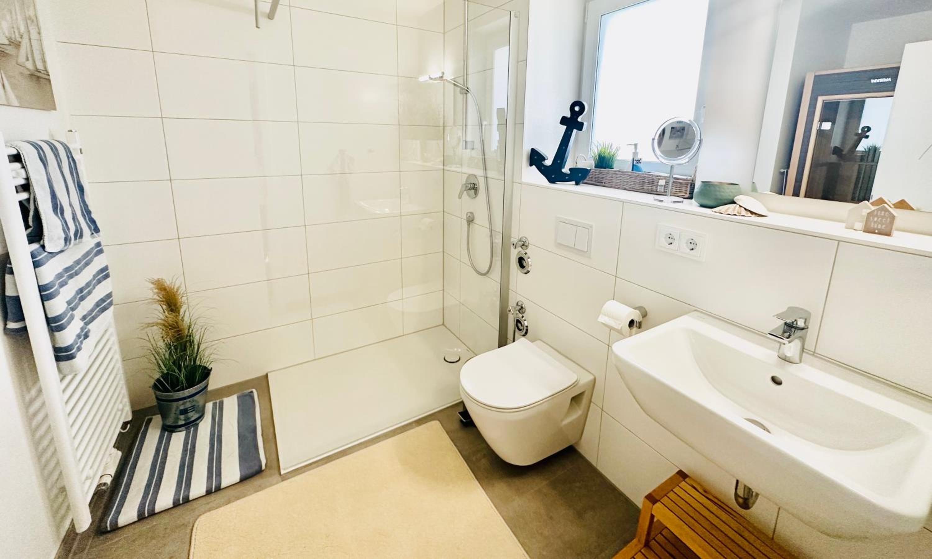 Nordlicht, Olpenitz - moderne Ferienwohnung in direkter Strandnähe mit eigenem Eingang, Sauna, Kaminofen, Terrasse und Parkplatz