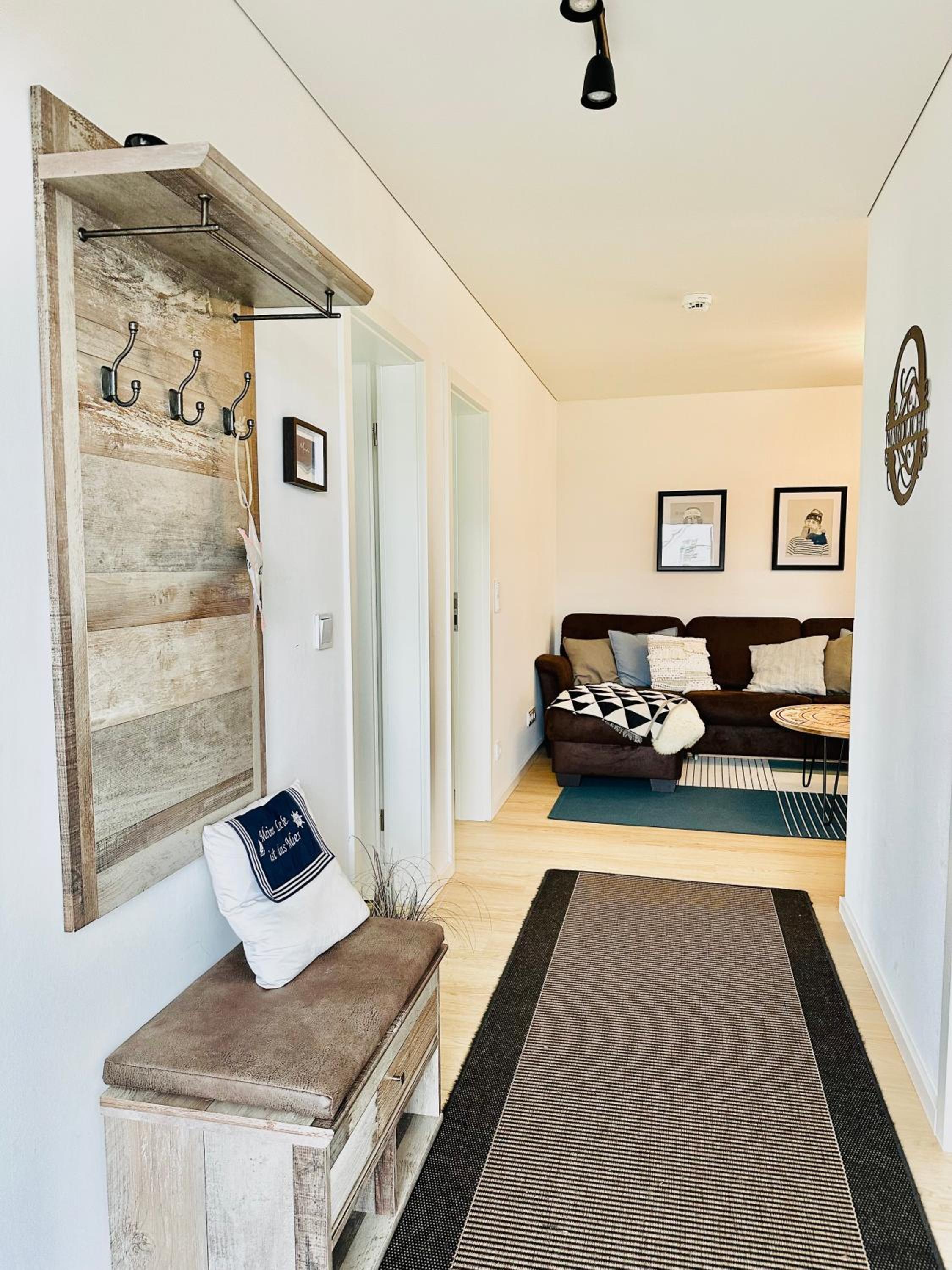 Nordlicht, Olpenitz - moderne Ferienwohnung in direkter Strandnähe mit eigenem Eingang, Sauna, Kaminofen, Terrasse und Parkplatz