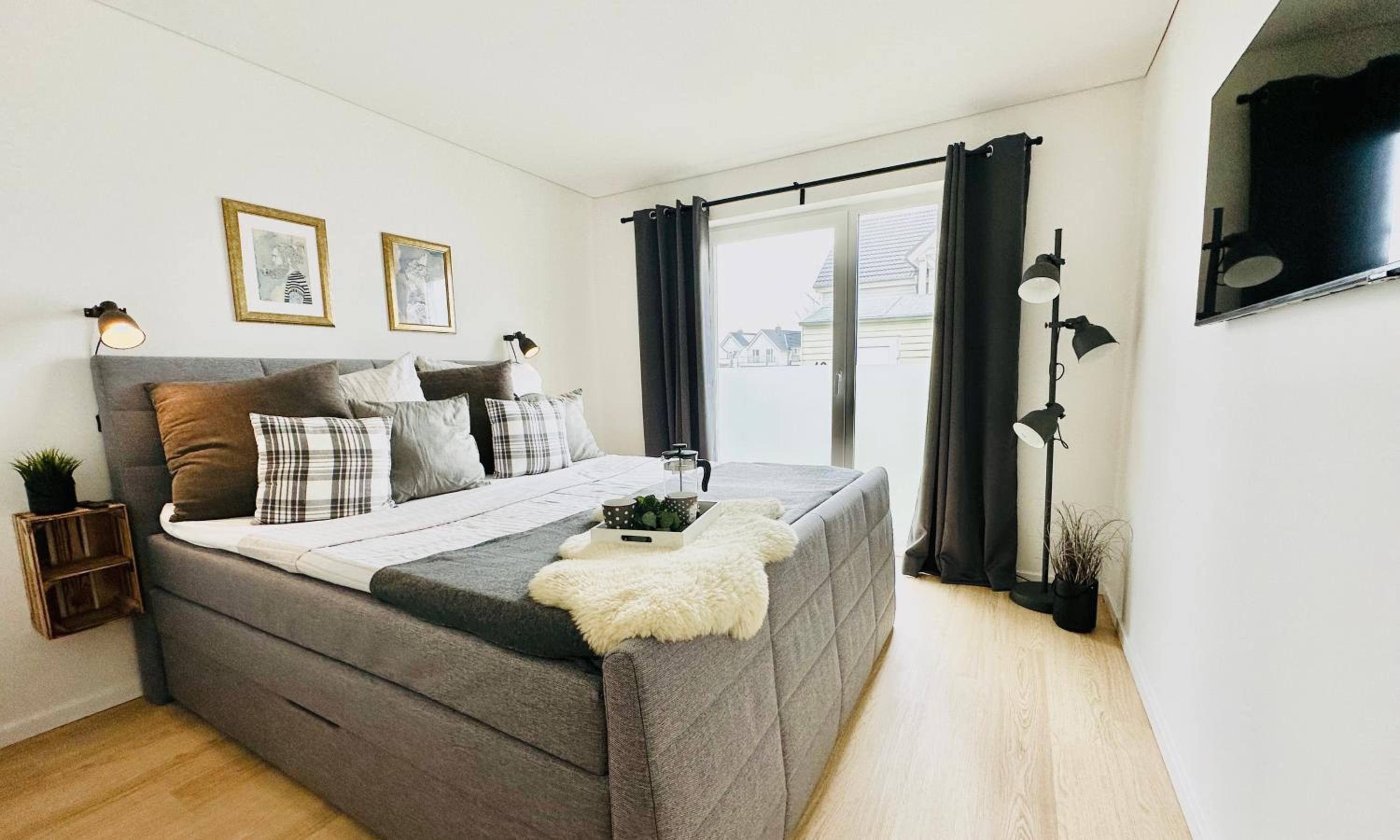 Nordlicht, Olpenitz - moderne Ferienwohnung in direkter Strandnähe mit eigenem Eingang, Sauna, Kaminofen, Terrasse und Parkplatz