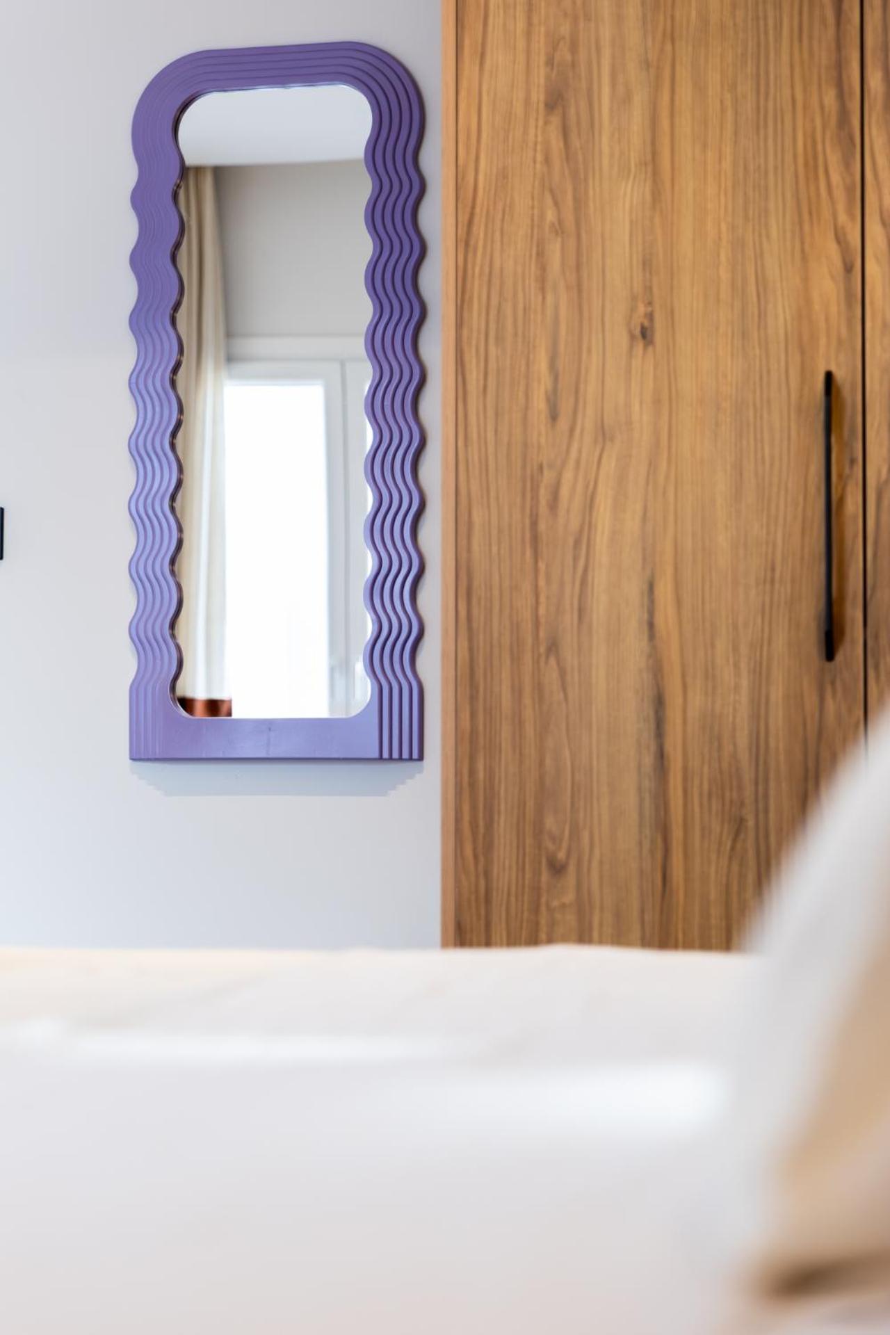 Cozy Apartment steps away from Acropolis and the Metro Station by Lumen Living