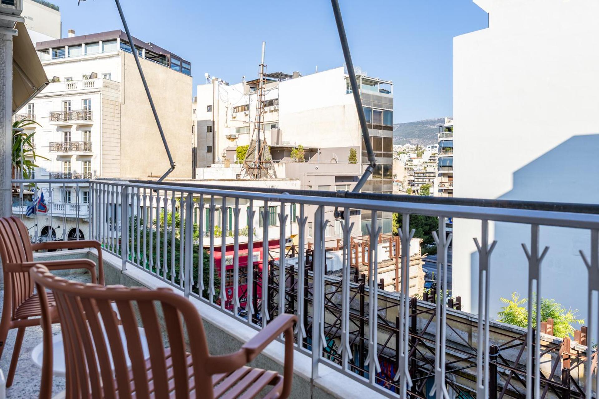 Cozy Apartment steps away from Acropolis and the Metro Station by Lumen Living