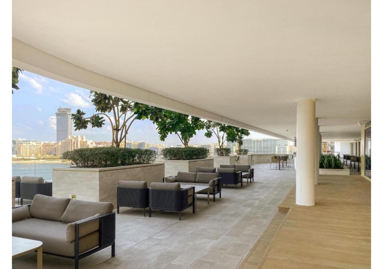 KeyRock - Palm View Apt with Pool & Gym Access