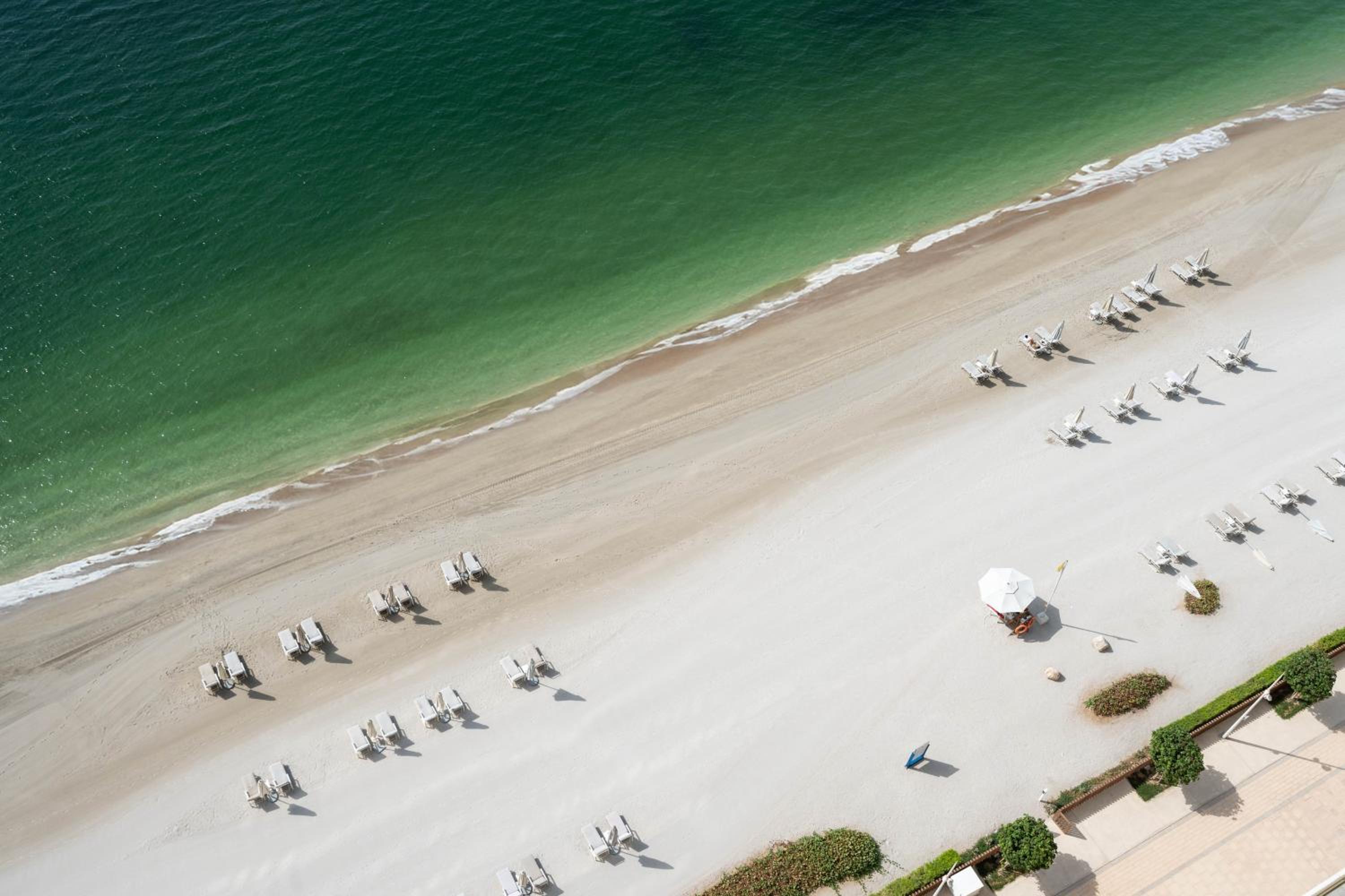 KeyRock - Palm & Sea View Retreat with Pool Access