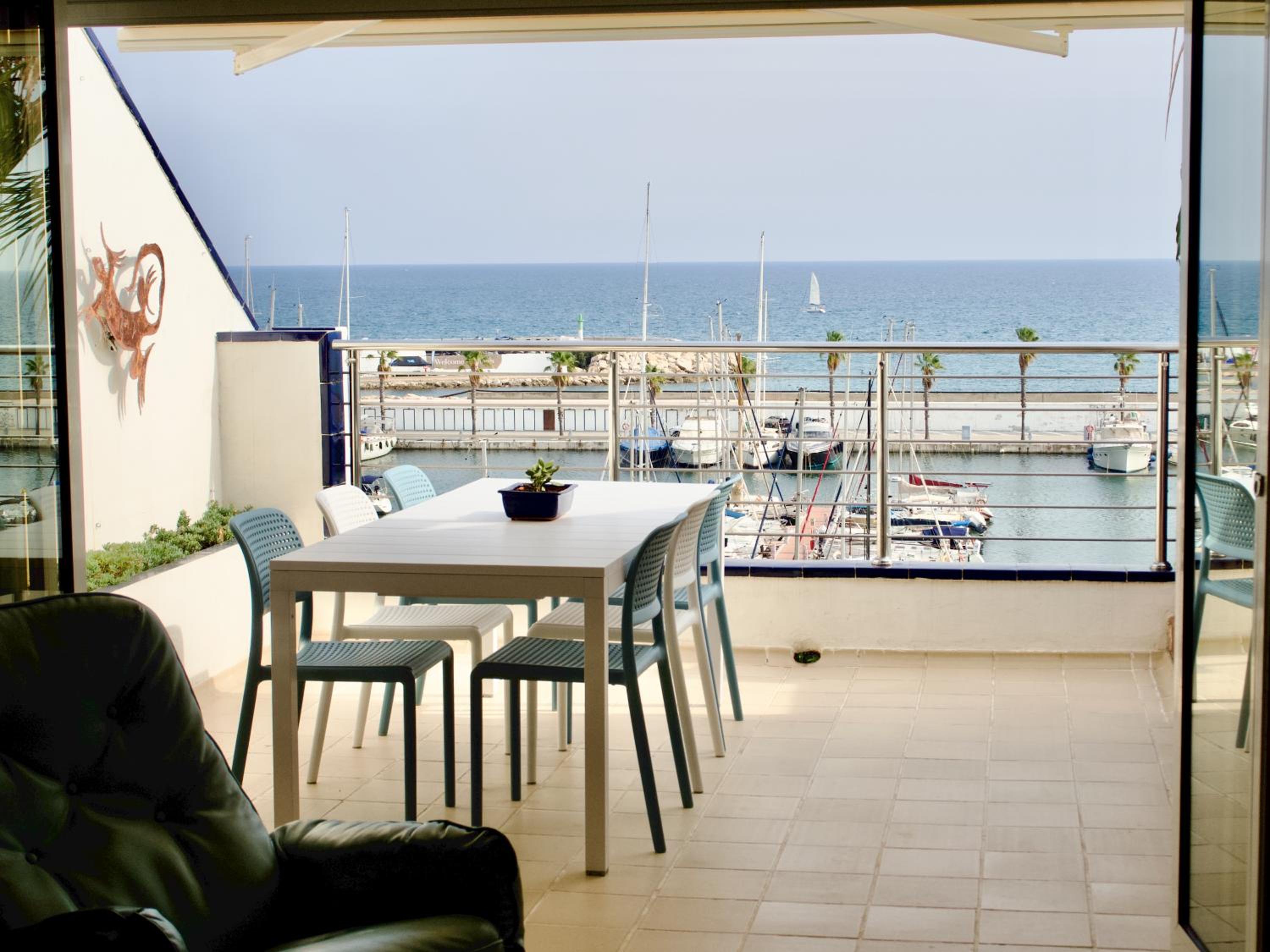 Stunning sea views over marina with swimming pool