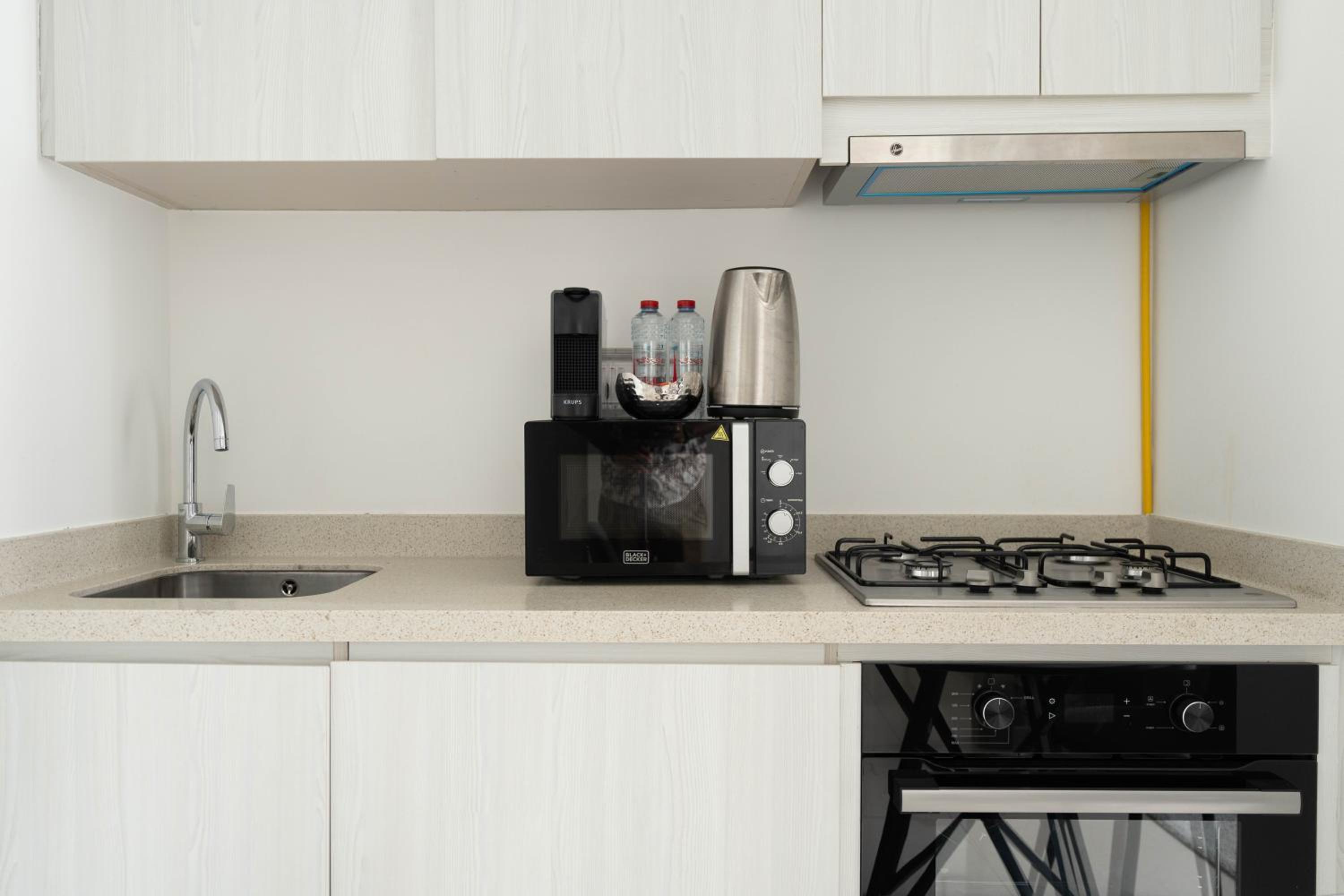 KeyRock - Modern 1BR in Zada with Pool & View