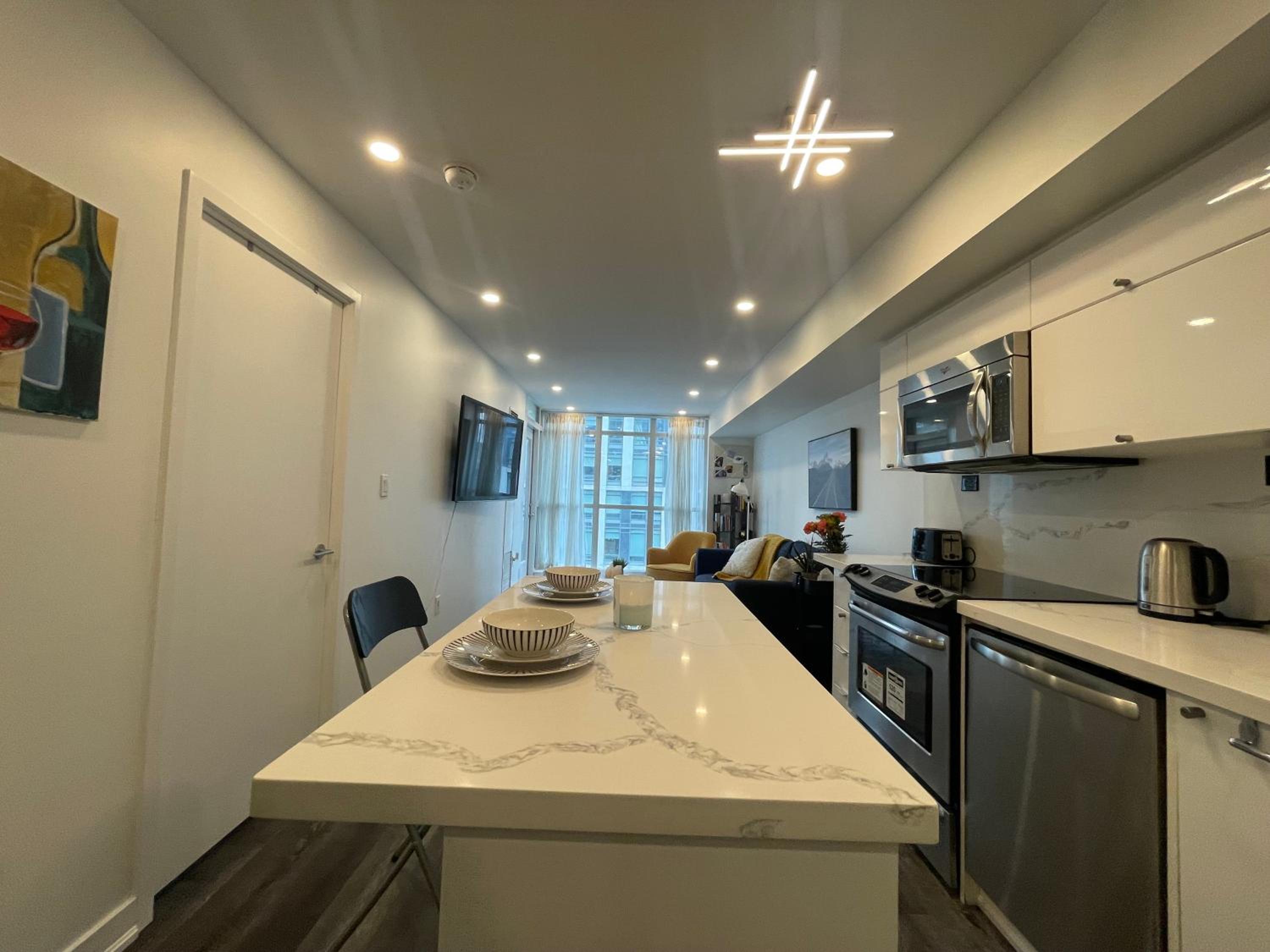 Elegant Downtown 2Bd Condo with Balcony