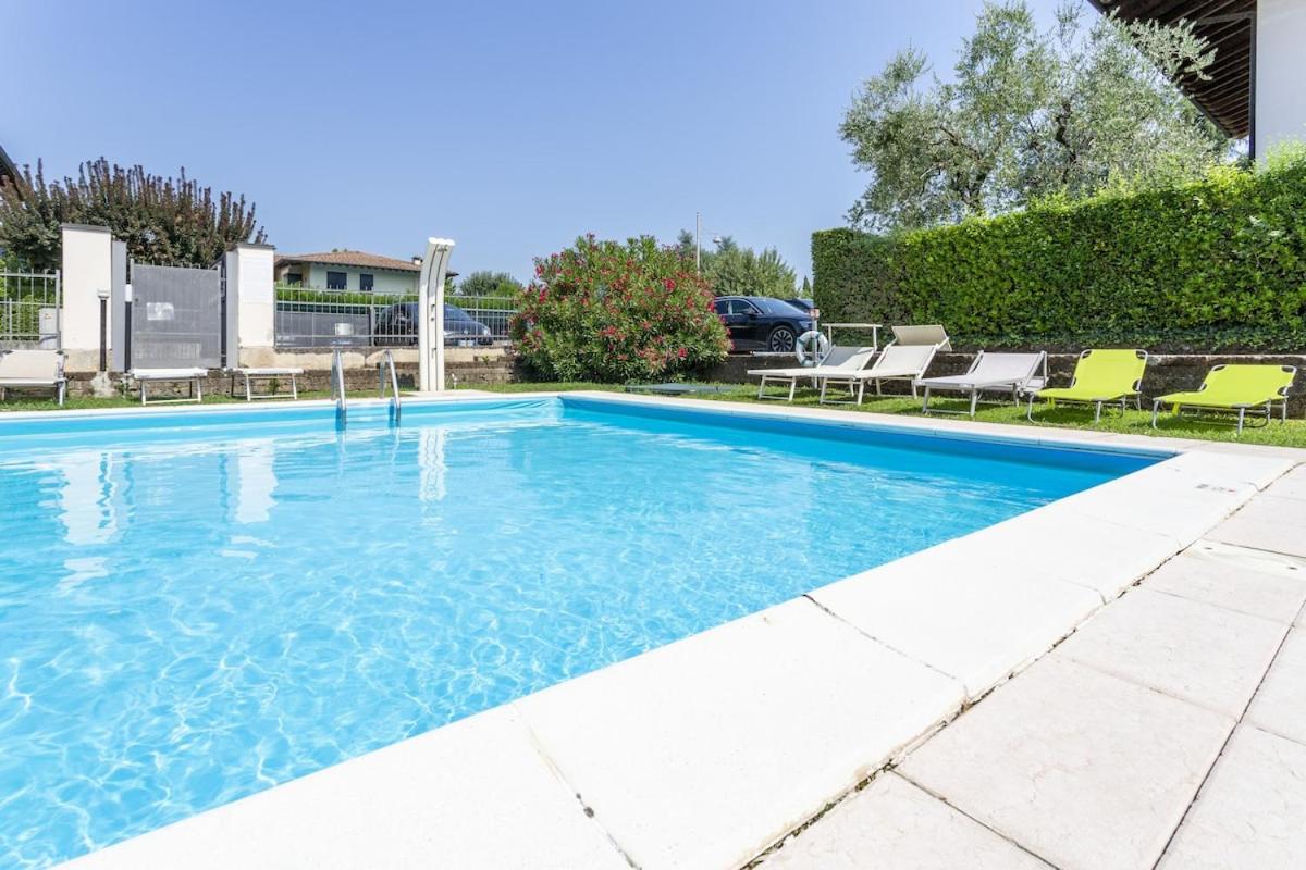 HOST4U - CASETTA di VIOLA con Piscina e Parcheggio a due passi dal Lago di Garda