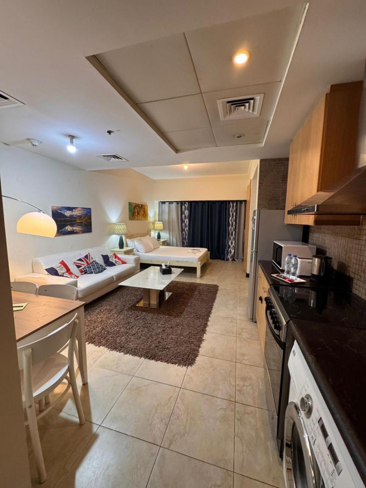Click Stay - JLT - Entire Studio & Balcony Lakes view Apartment -AM