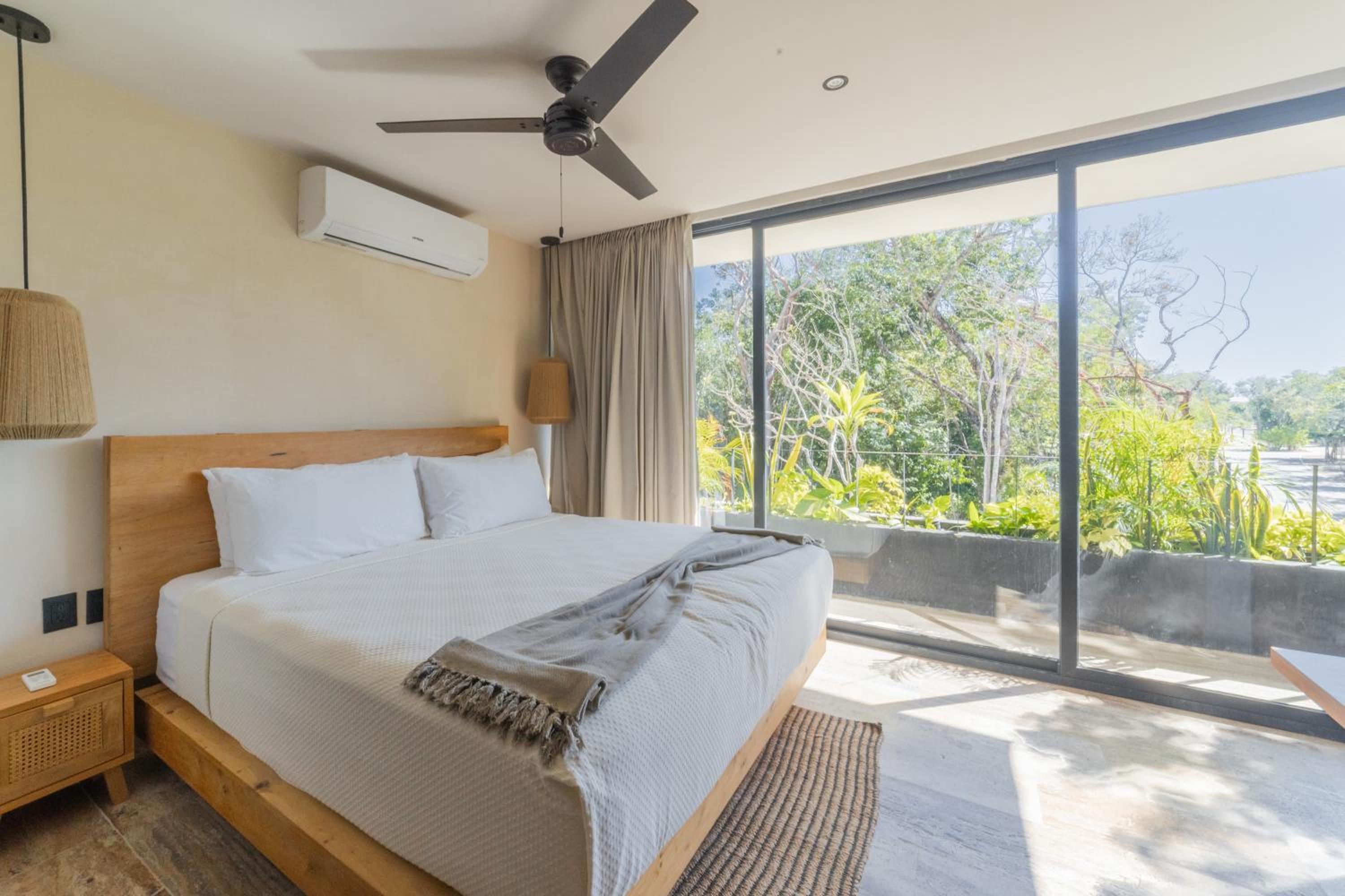BT Homes - Tulum - Exclusiva villa de lujo con piscina, gym y pista de pádel