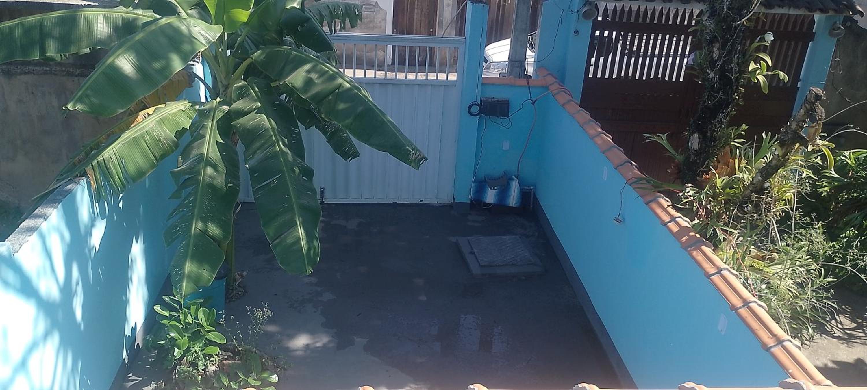 Charmosa Casa de Madeira a 700 metros da praia com estacionamento