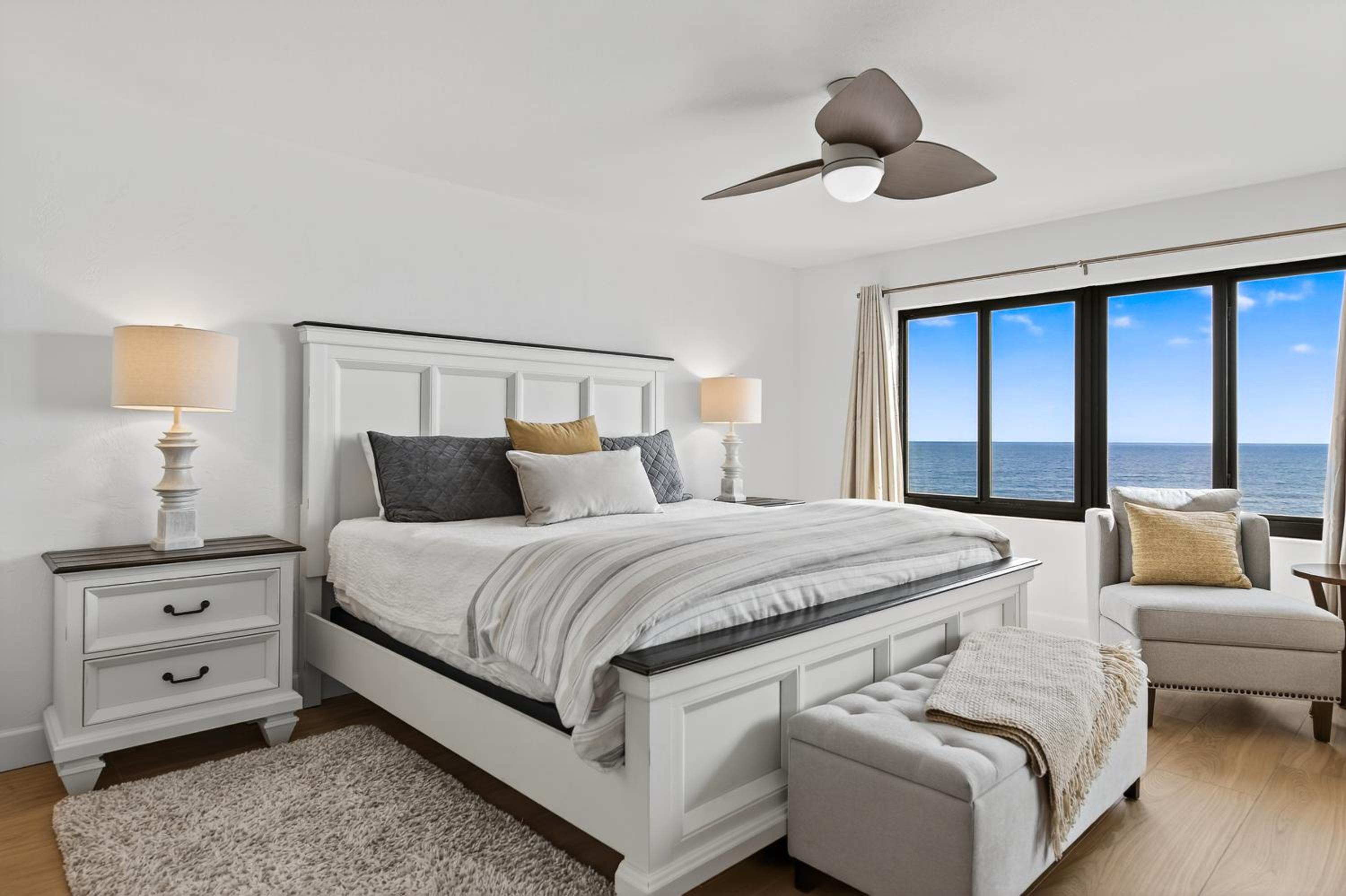 Luxury direct oceanfront corner with a large private balcony, heated pool and garage