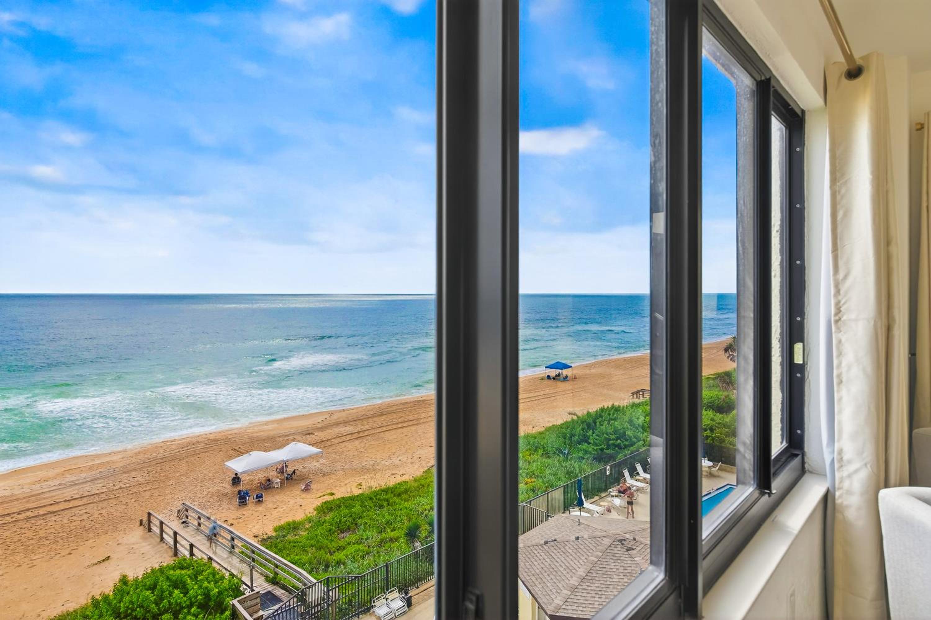 Luxury direct oceanfront corner with a large private balcony, heated pool and garage