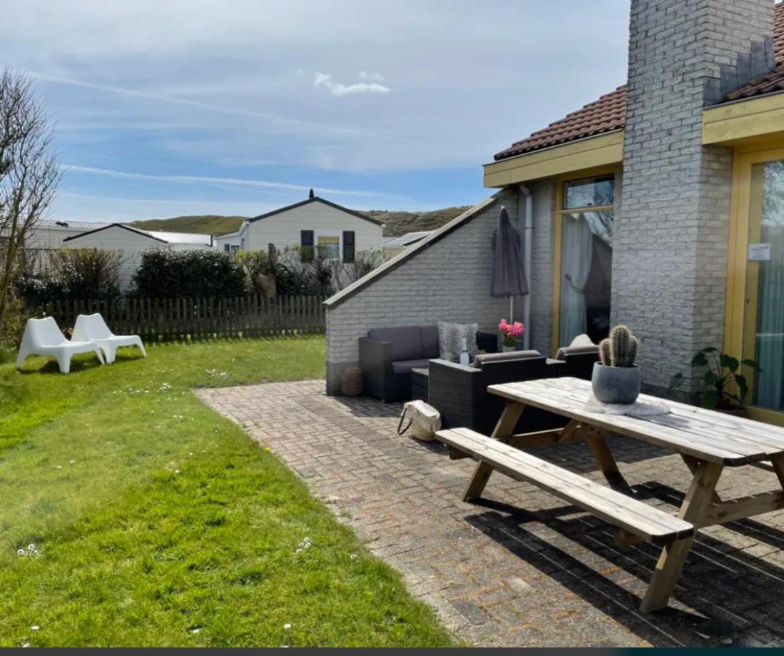 Strand en duinen 331 omheinde tuin