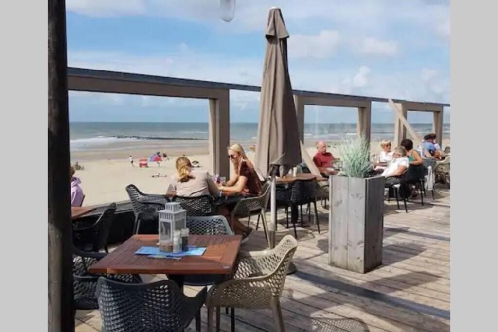 Strand en duinen 331 omheinde tuin