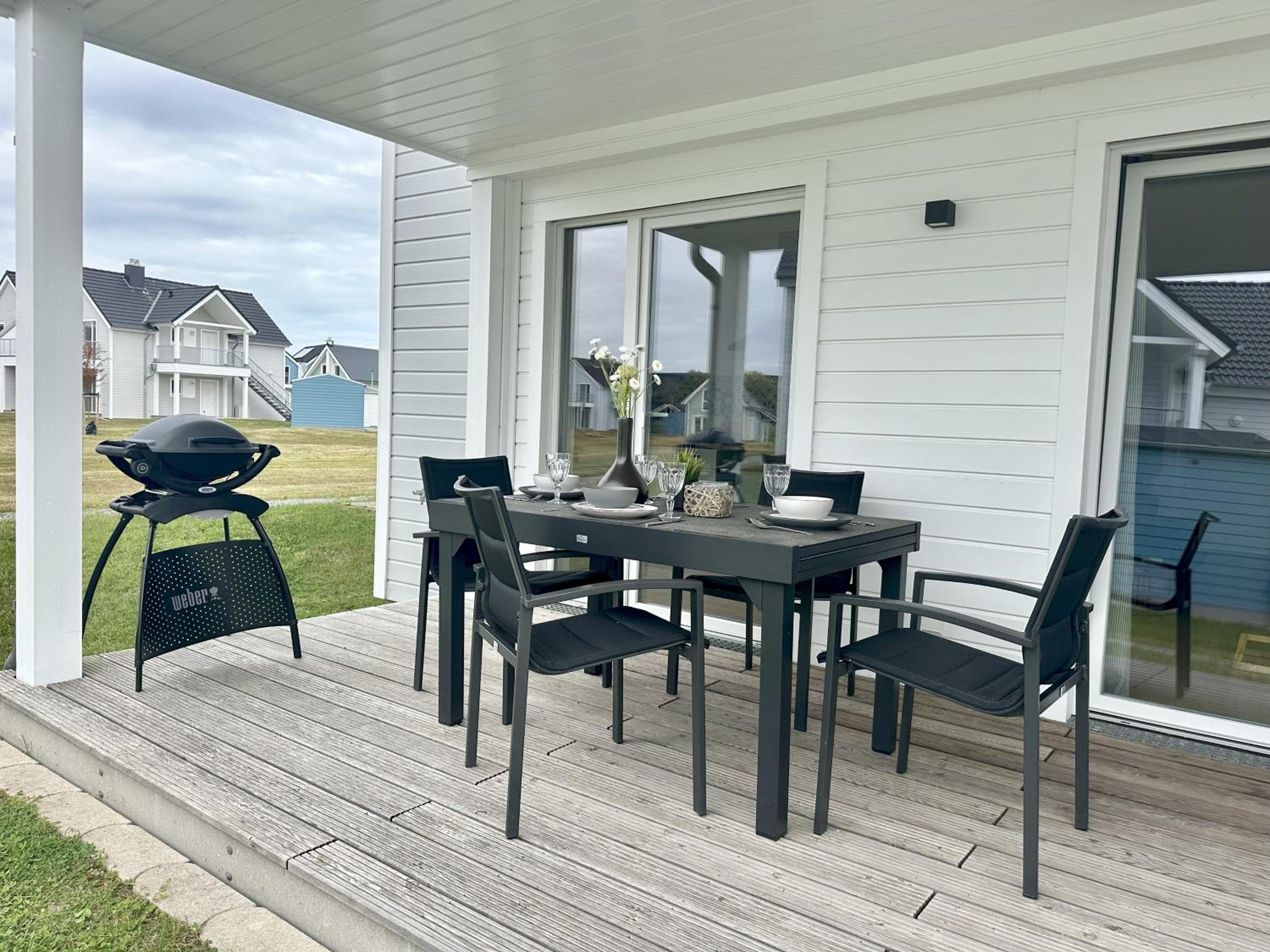 Nordlicht, Olpenitz - moderne Ferienwohnung in direkter Strandnähe mit eigenem Eingang, Sauna, Kaminofen, Terrasse und Parkplatz