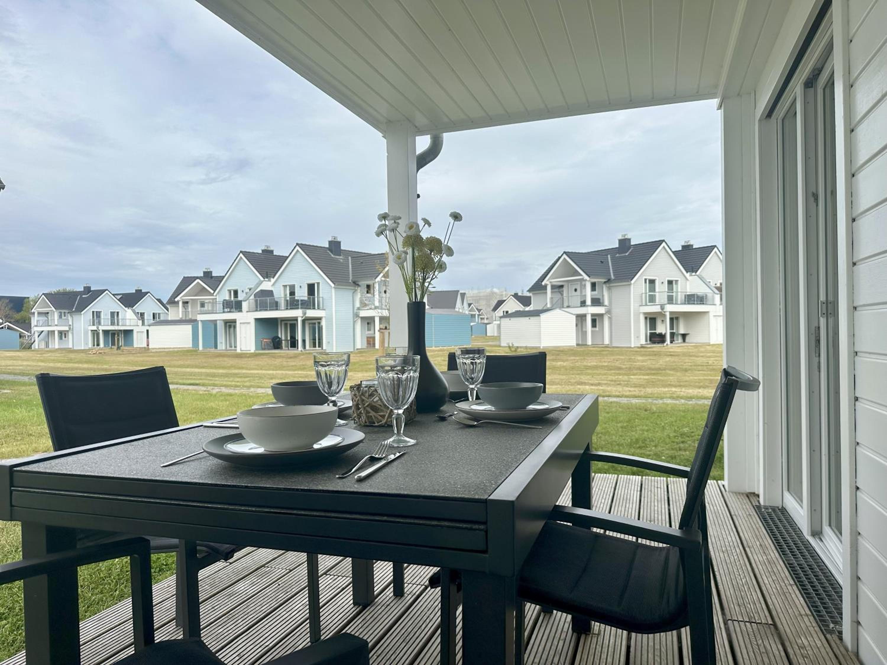 Nordlicht, Olpenitz - moderne Ferienwohnung in direkter Strandnähe mit eigenem Eingang, Sauna, Kaminofen, Terrasse und Parkplatz