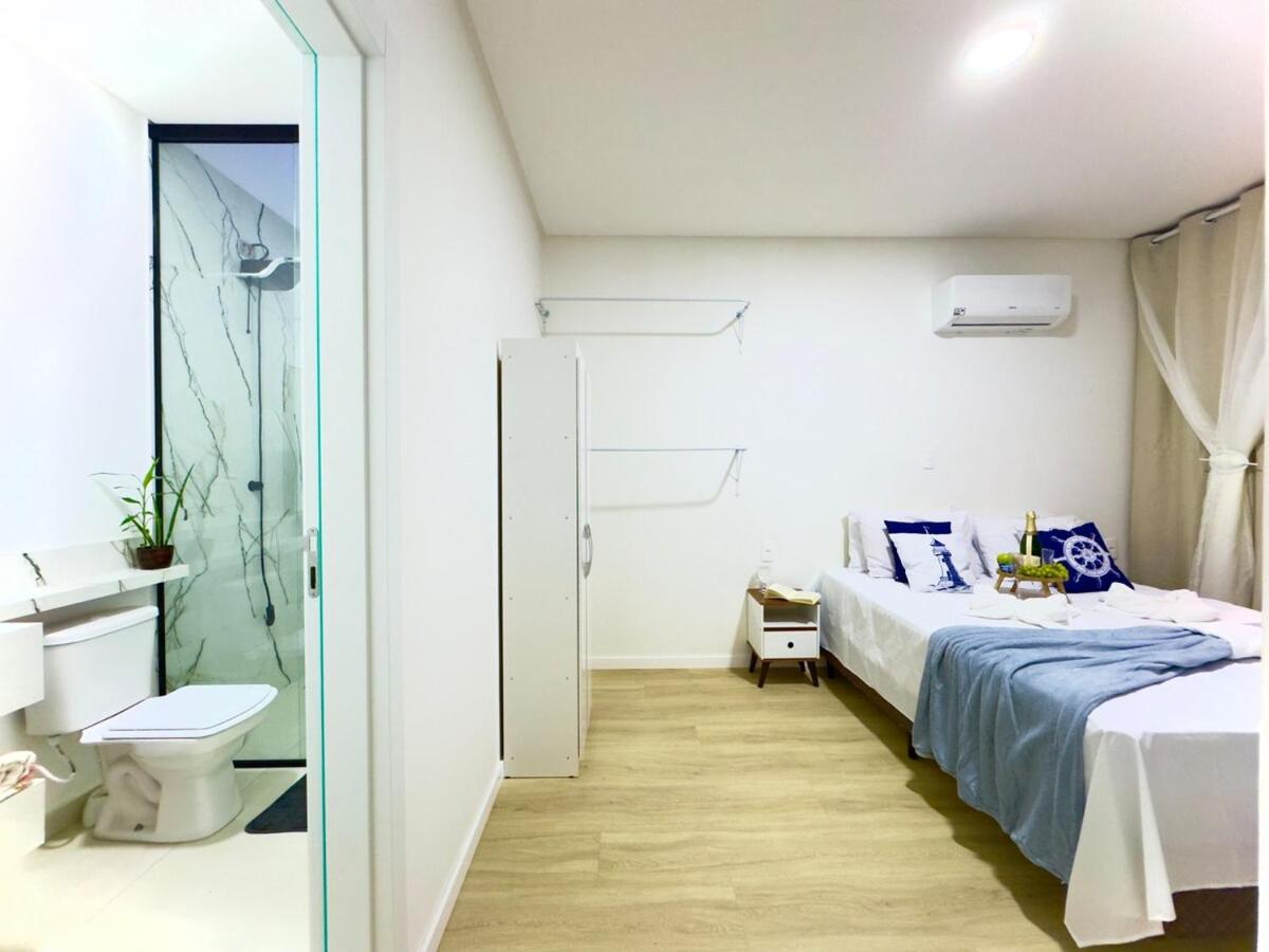 Casa em Bal Picarras 3 quartos churrasqueira privativa Ar Condicionado Wi-fi Cozinha Completa a 750m Praia com vaga privativa de Garagem