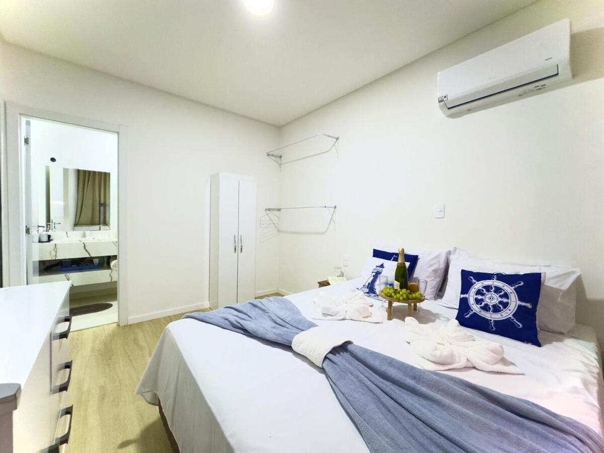 Casa em Bal Picarras 3 quartos churrasqueira privativa Ar Condicionado Wi-fi Cozinha Completa a 750m Praia com vaga privativa de Garagem