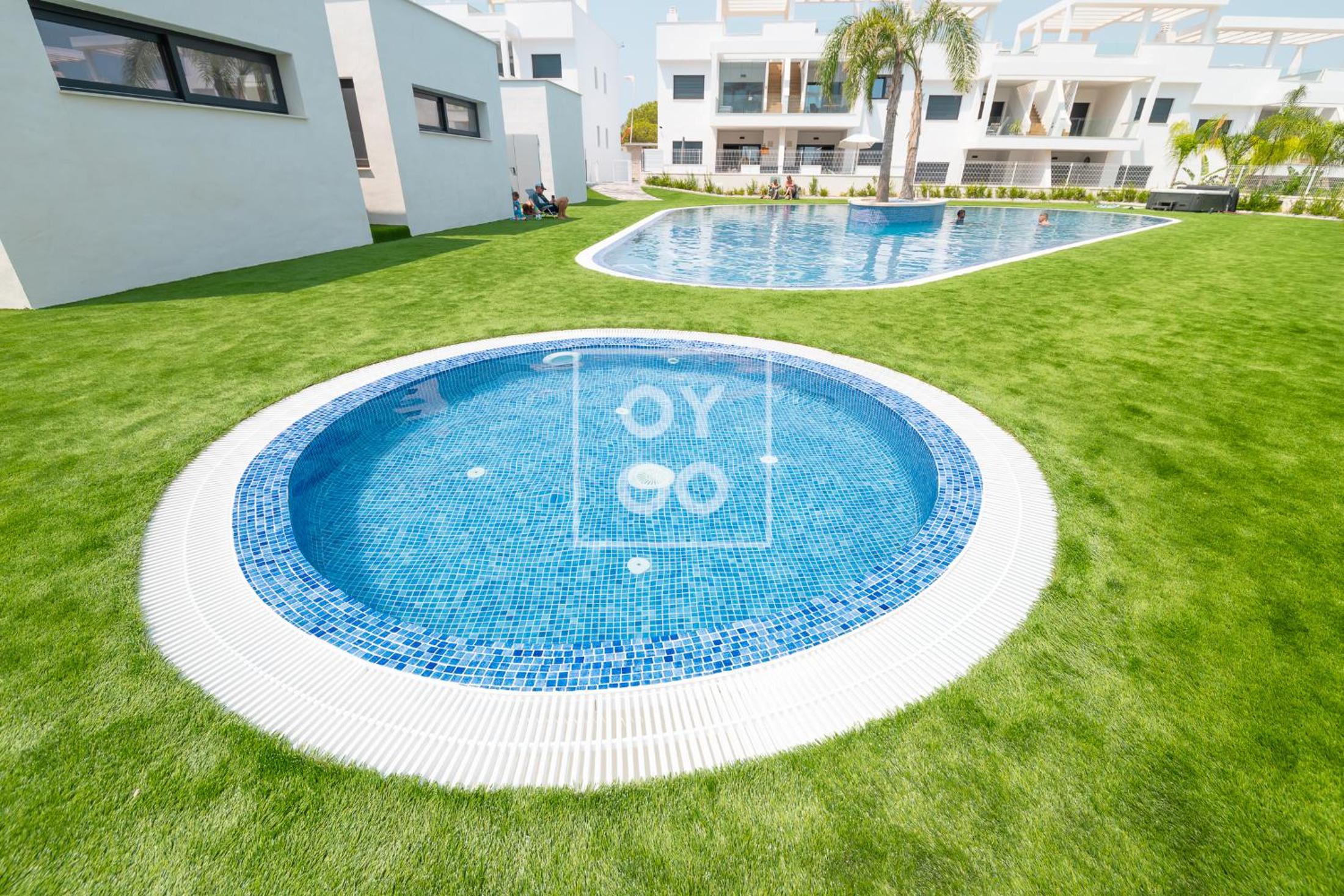 Nalia Horizon Penthouse, Outdoor living with solarium, BBQ, pool, hot tub - by OYOOSTAYS